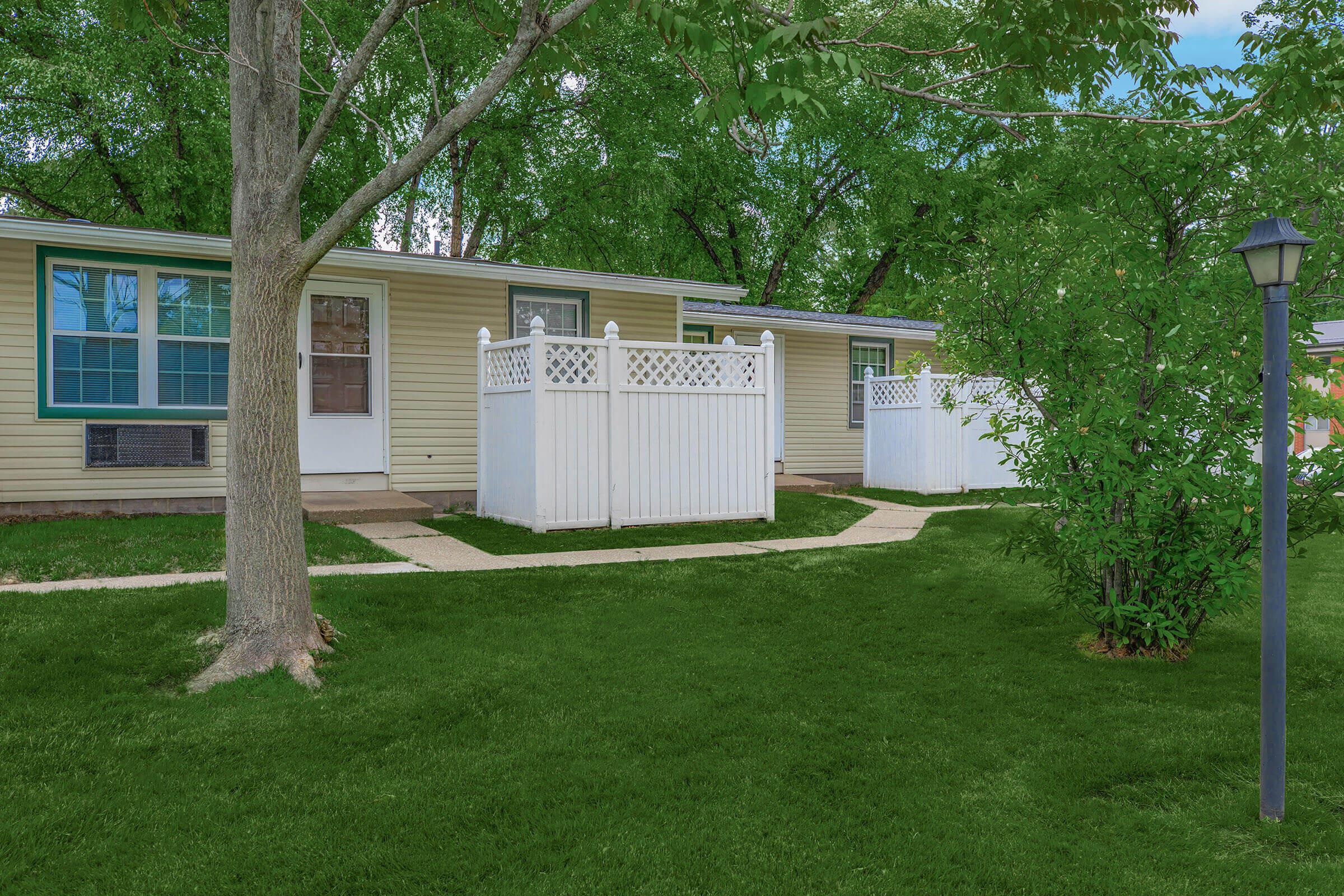 a large lawn in front of a house