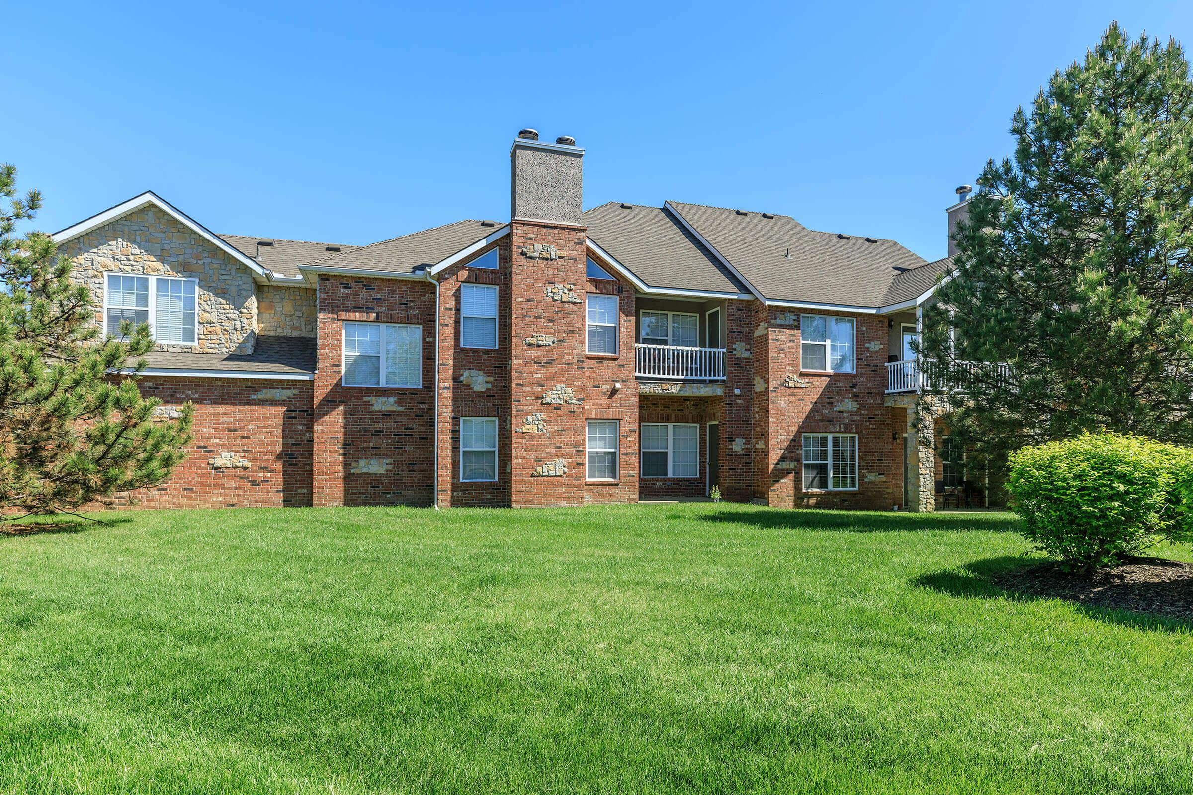 a large lawn in front of a house