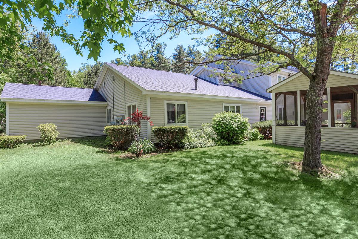 a large lawn in front of a house