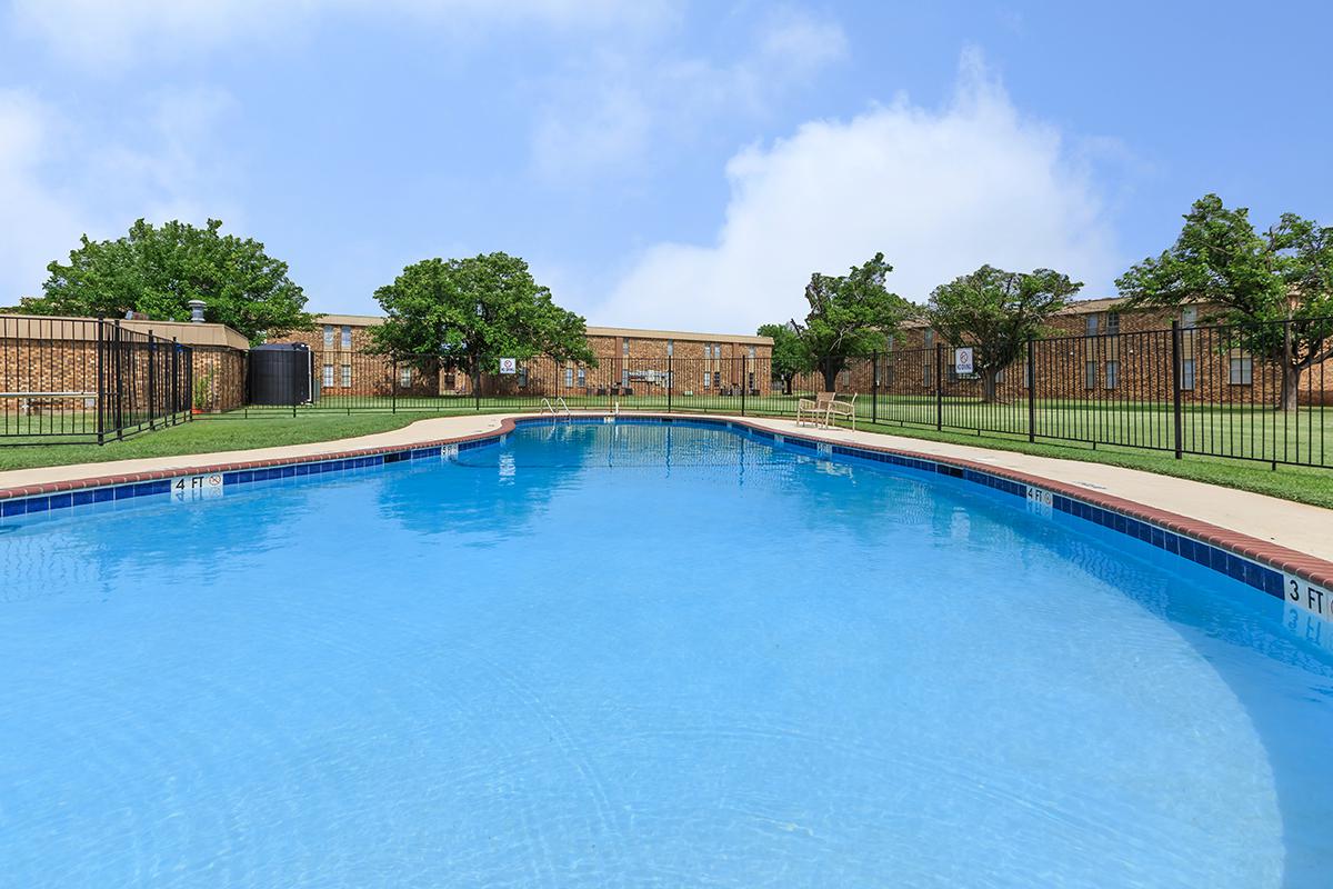 a pool next to a body of water