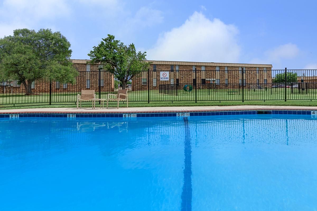 a pool next to a body of water