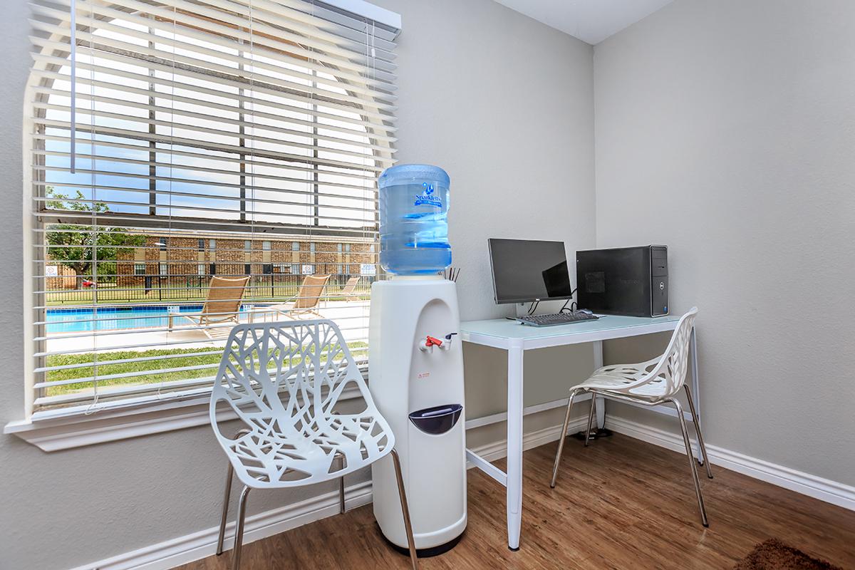 a chair sitting in front of a window