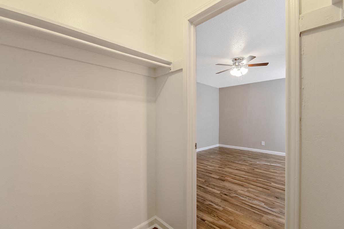 a white sink sitting next to a door