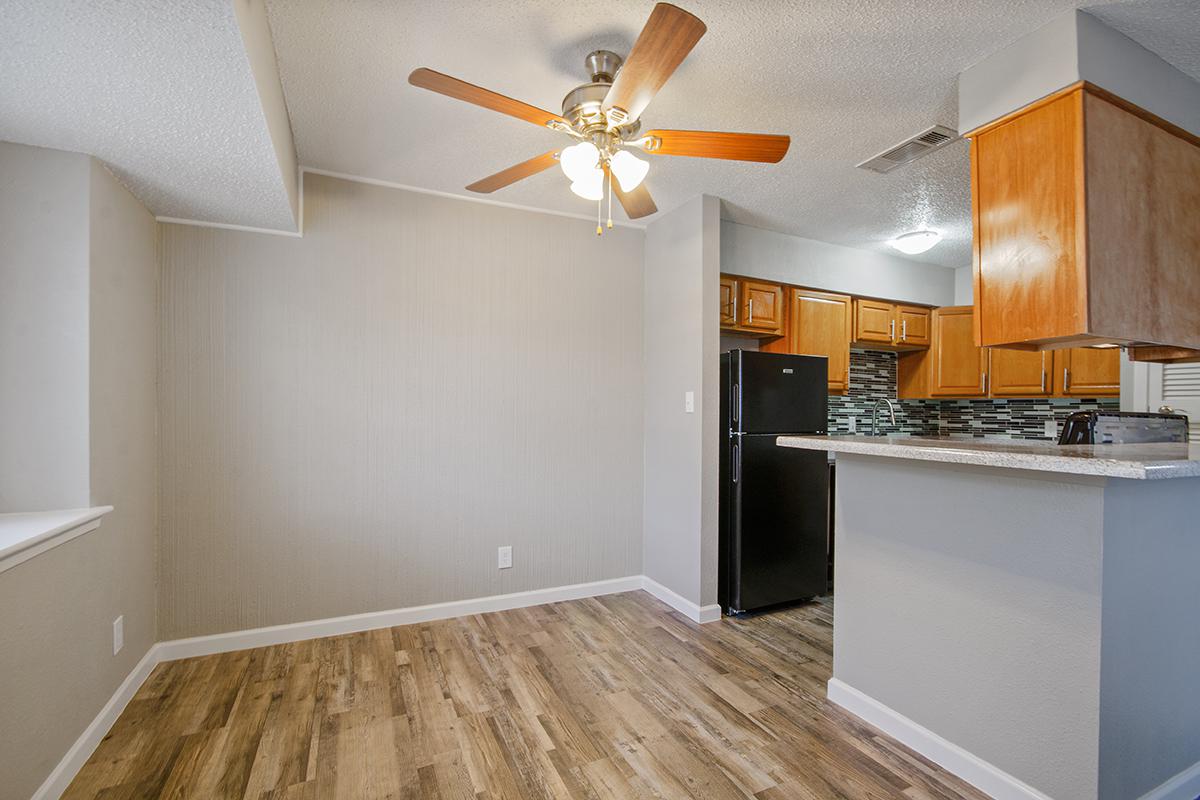 a kitchen with a wood floor