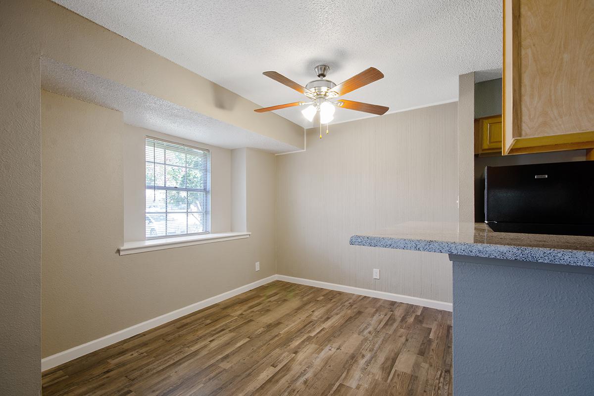 a kitchen with a sink and a window