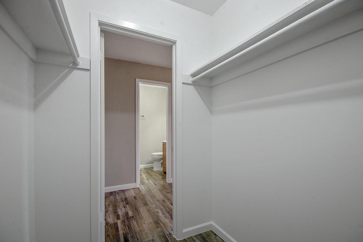 a white sink sitting next to a door