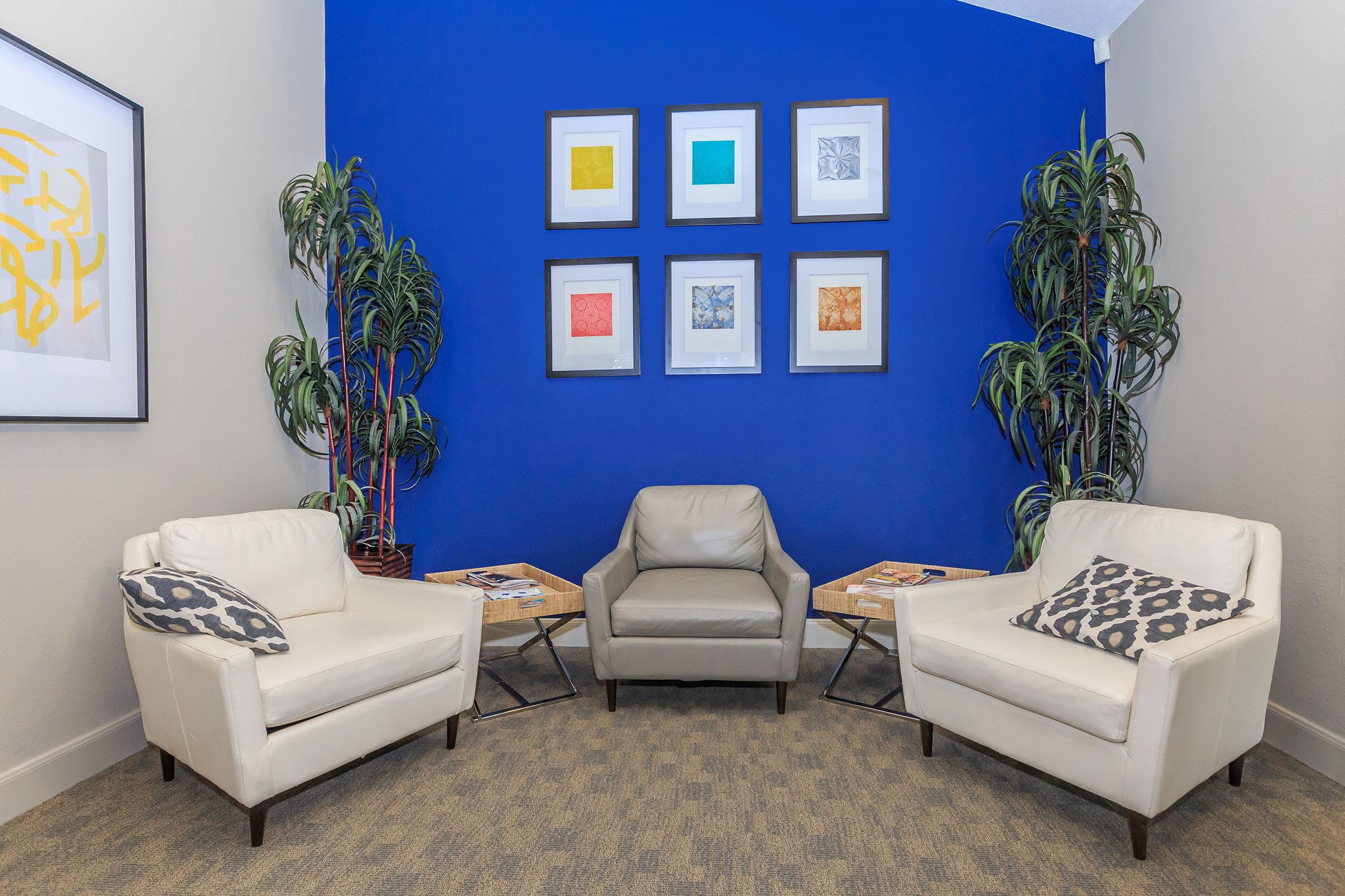 a living room with blue walls