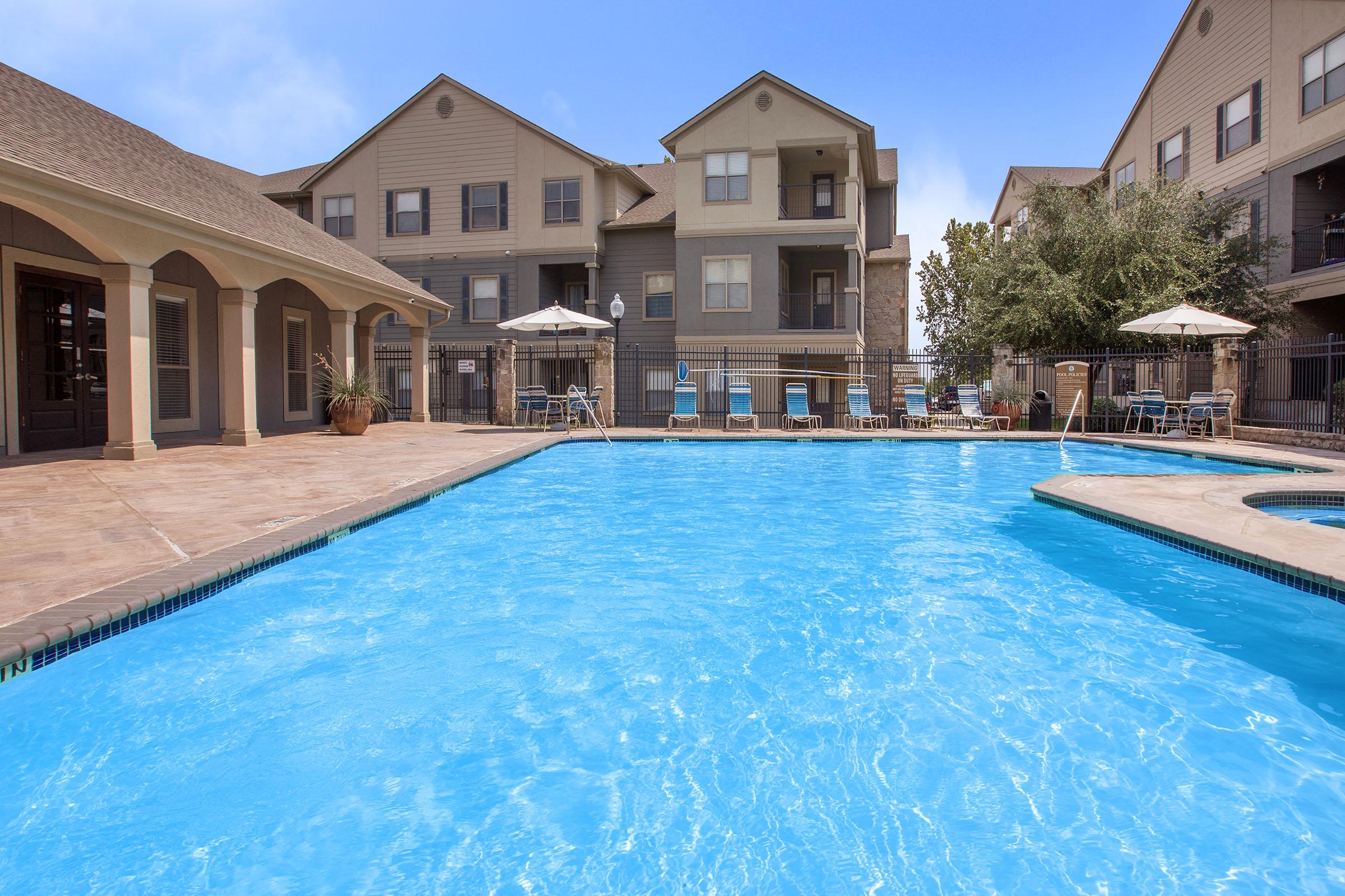 a house with a large pool of water