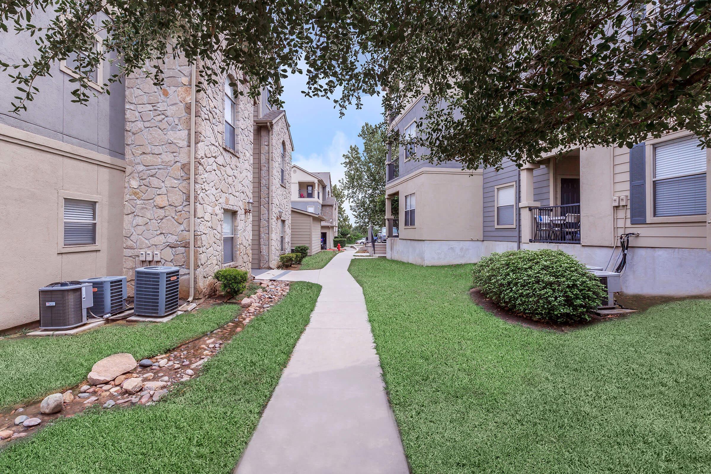 a large lawn in front of a building