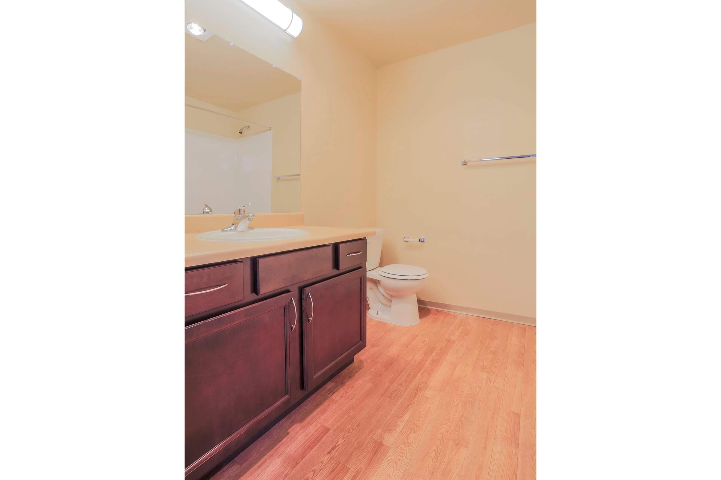 a kitchen with a wood floor