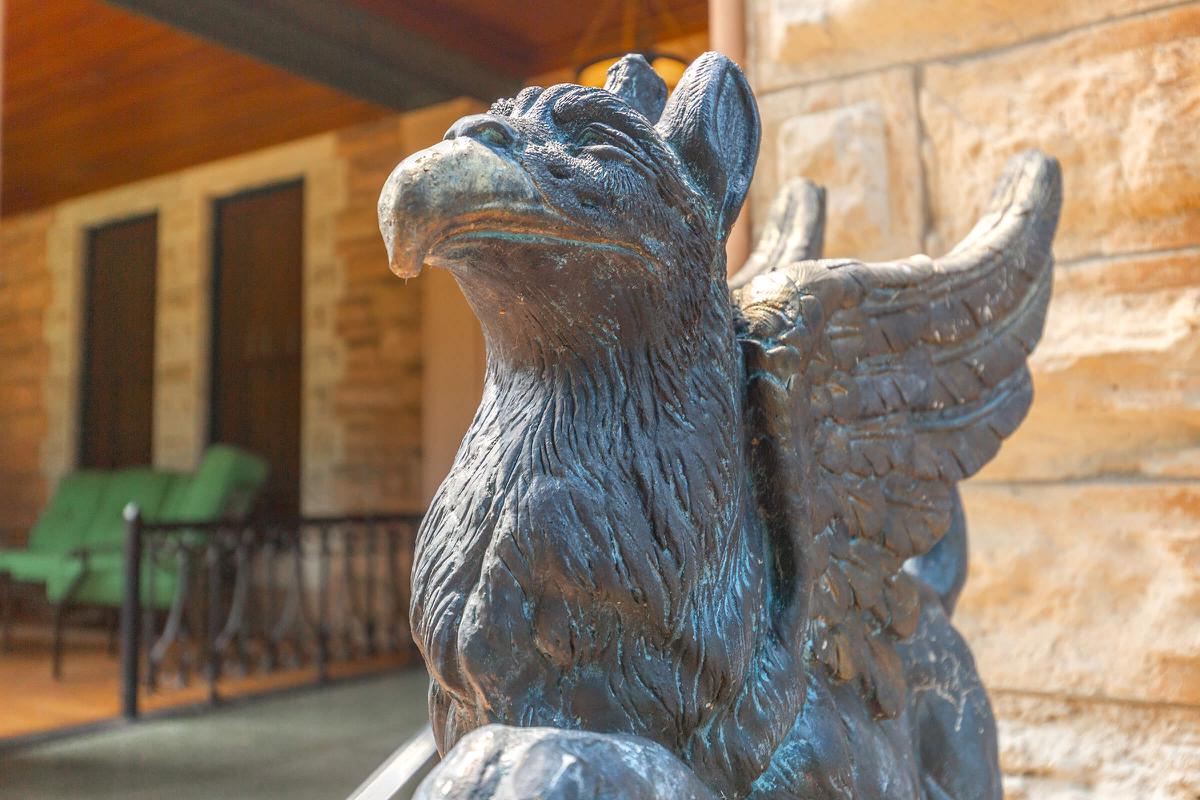 a close up of a statue of a bird