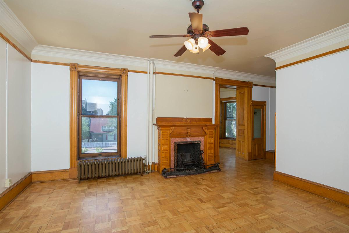 a view of a living room with a wood floor