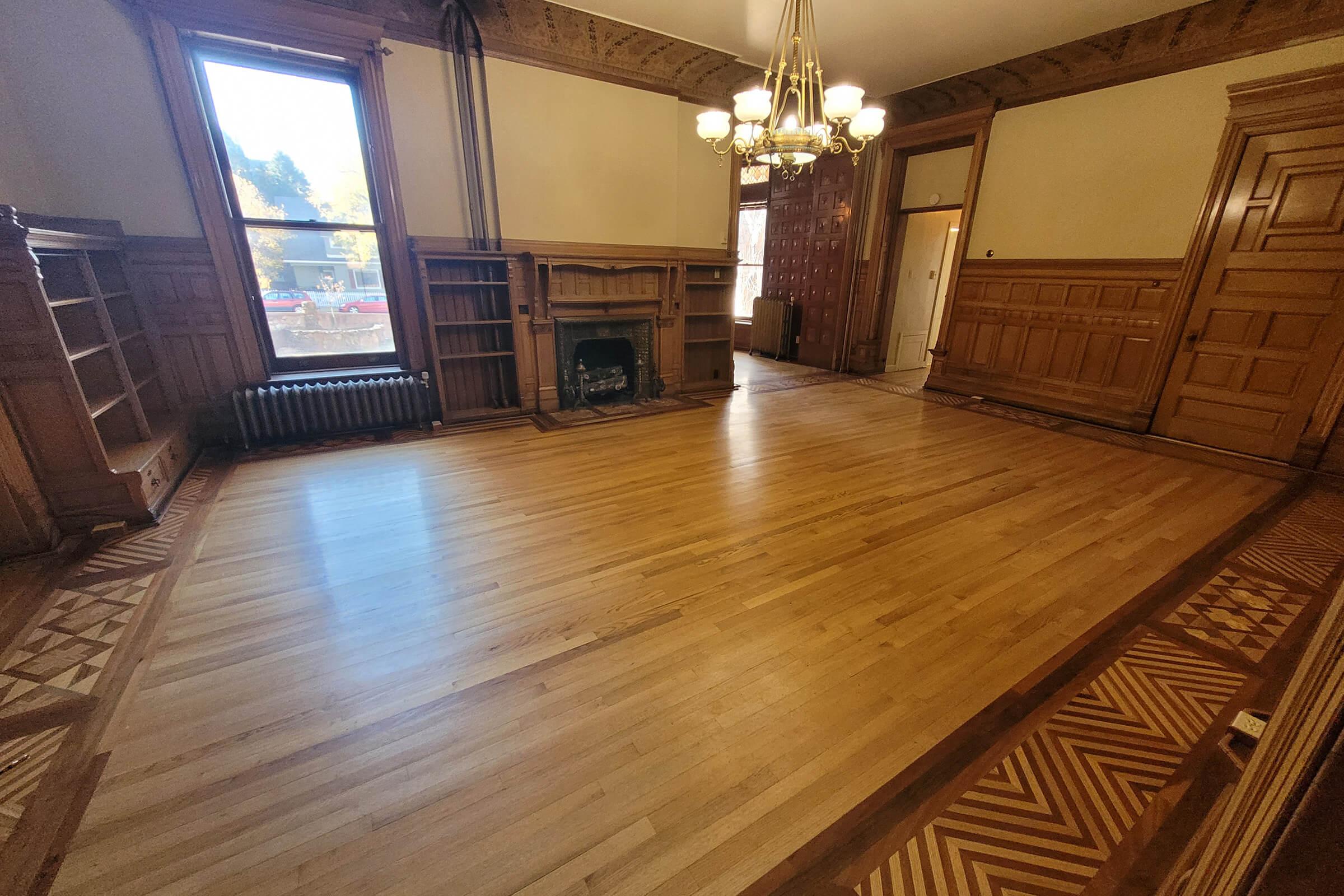 a view of a living room with a wood floor