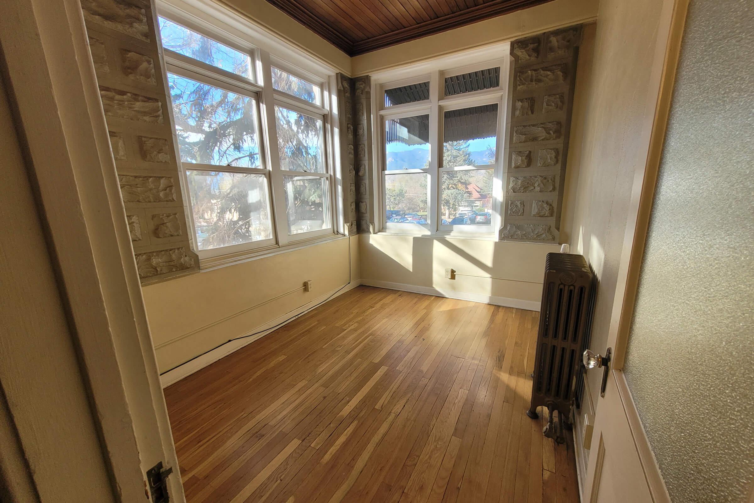 a view from the window of a wooden floor