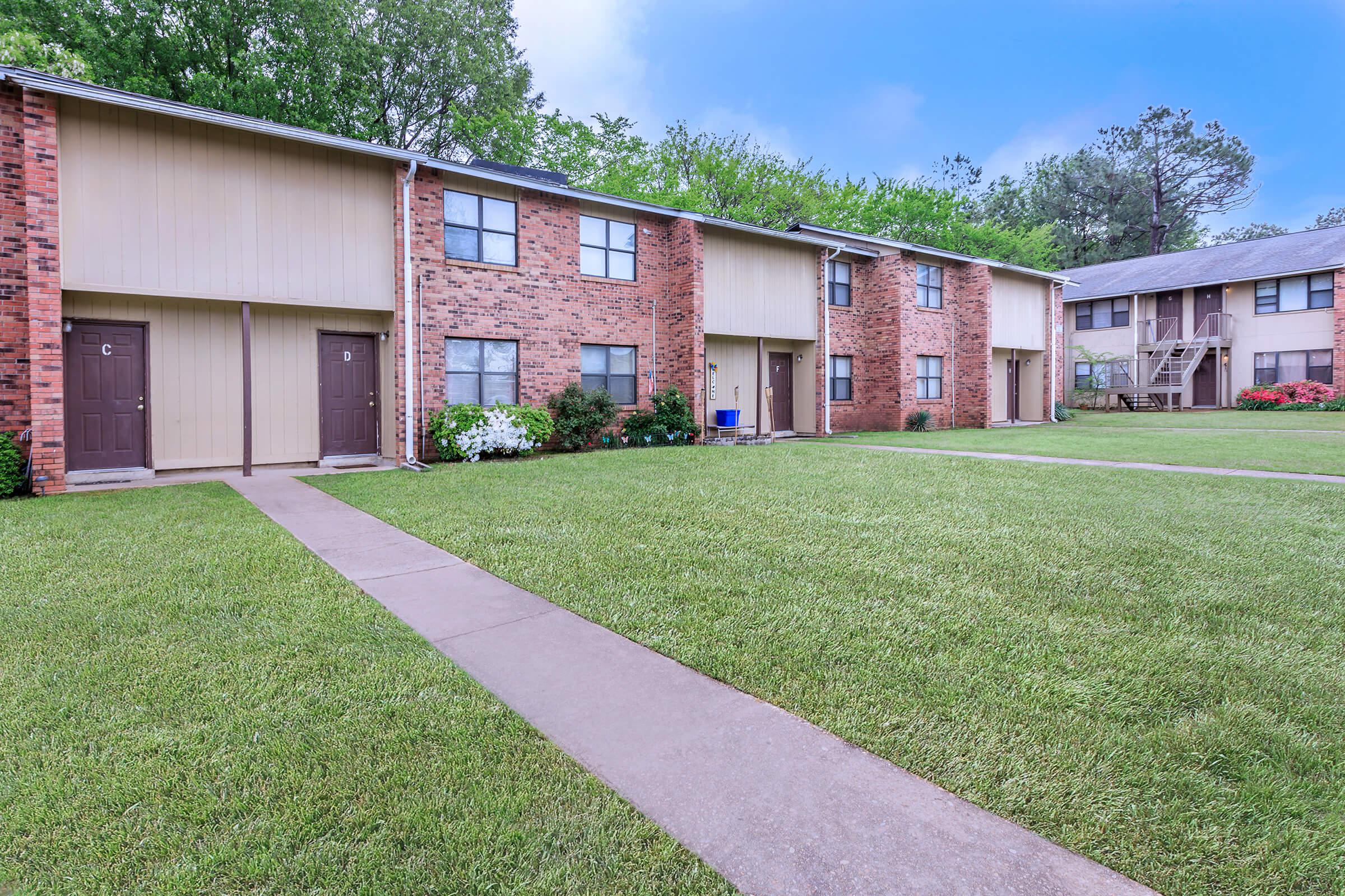 a large lawn in front of a house