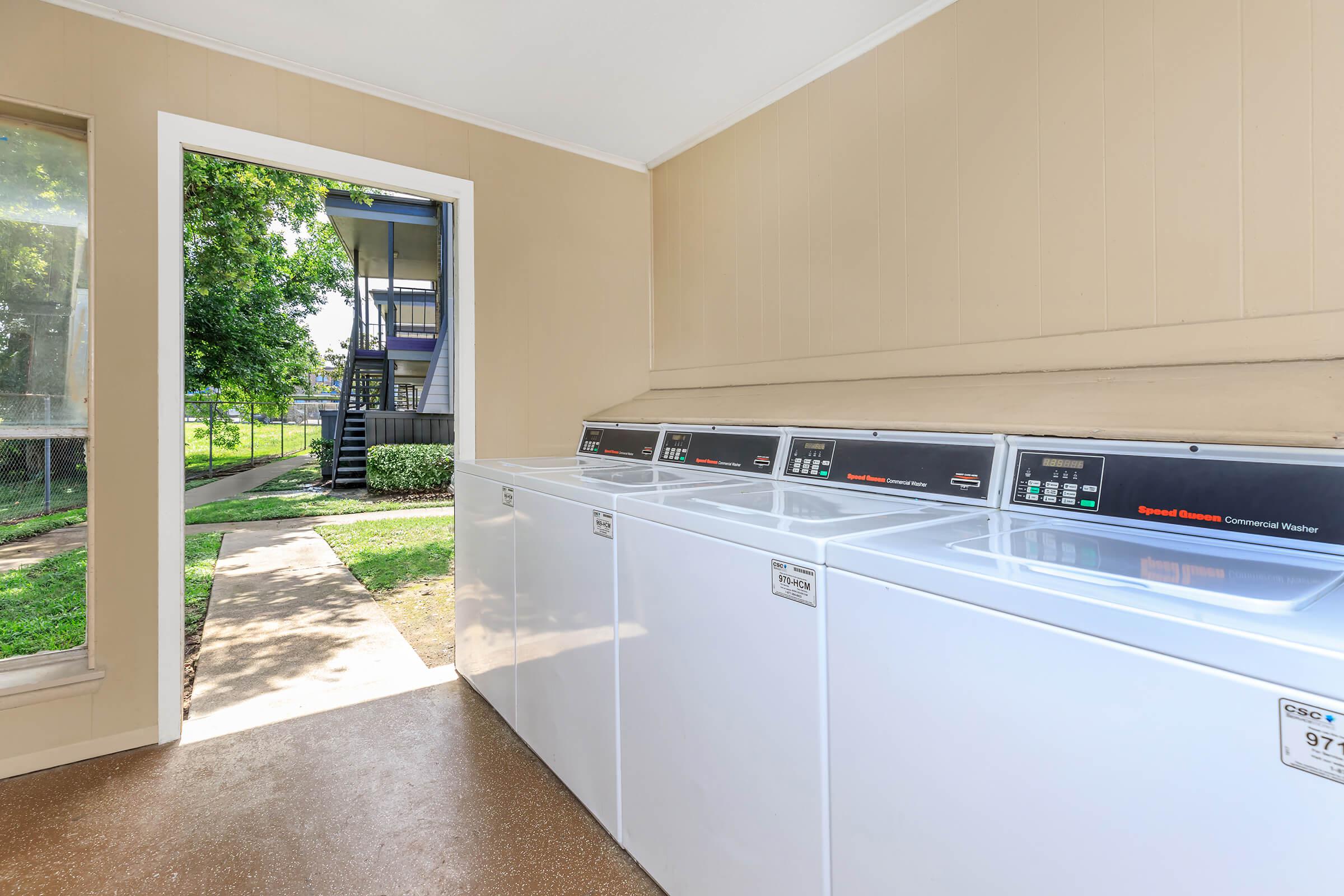 a kitchen with a large window