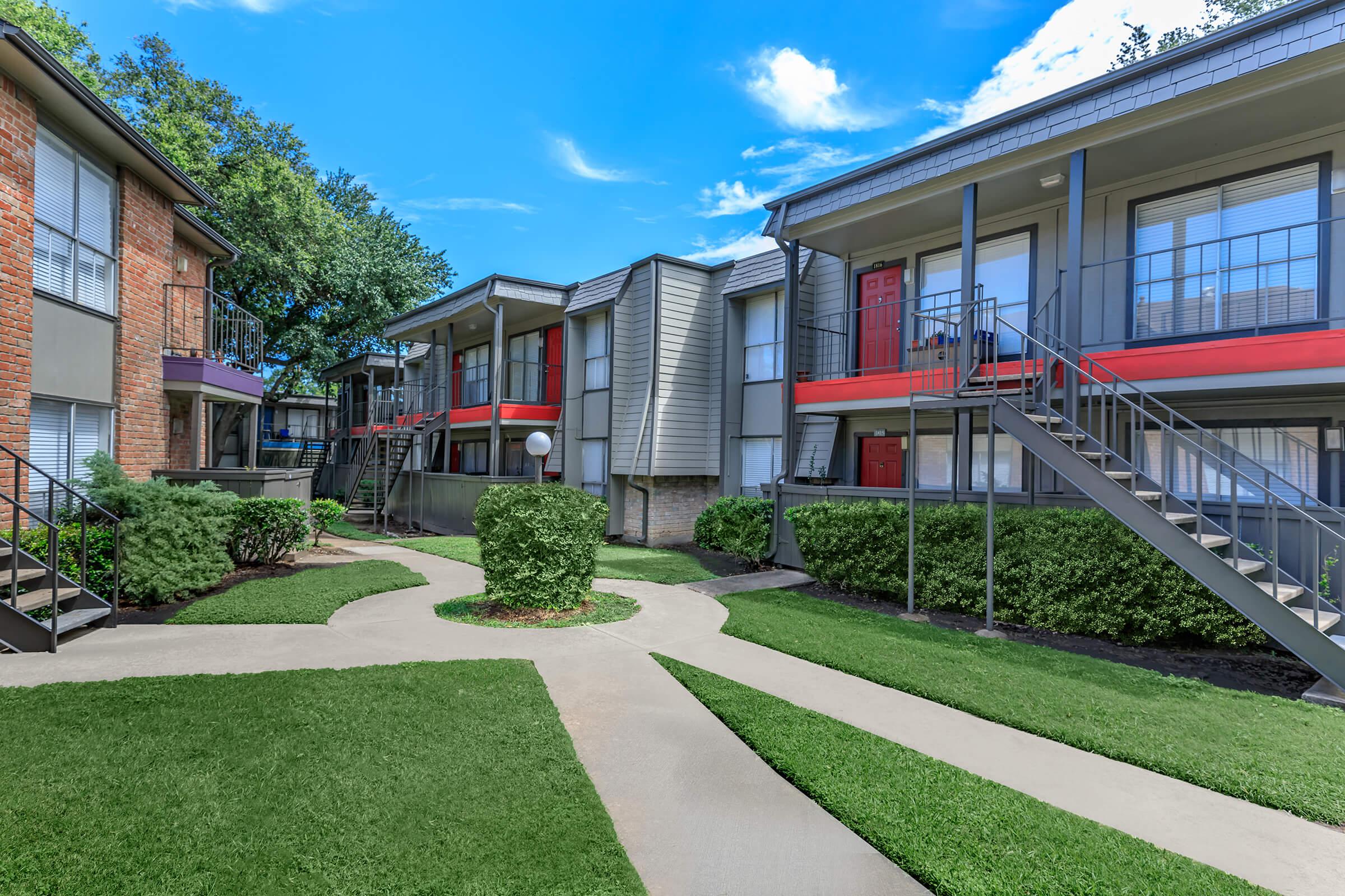 a large lawn in front of a house