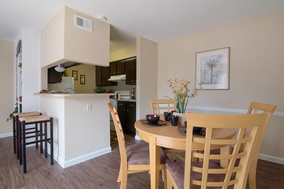 a kitchen with a dining room table