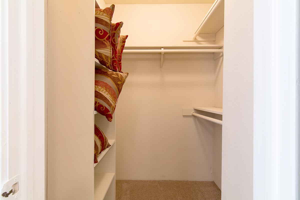 a white refrigerator freezer sitting next to a door