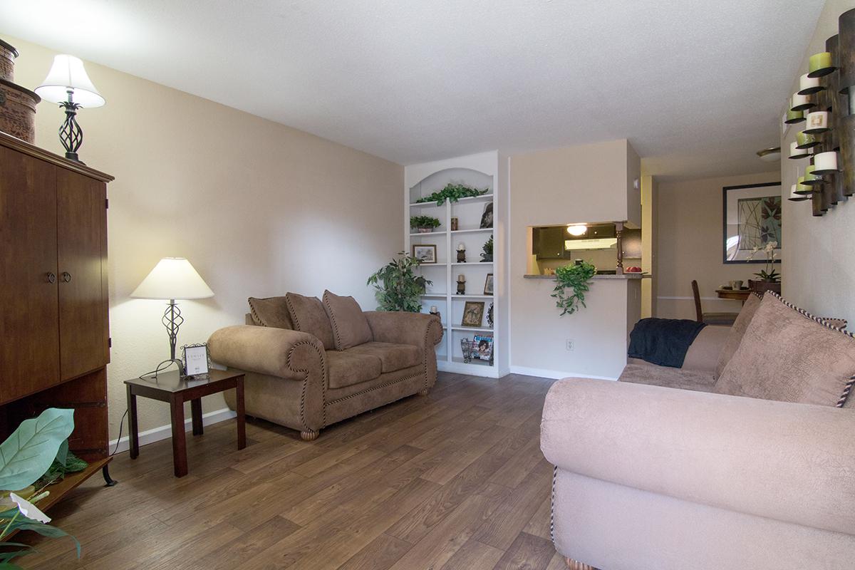 a living room filled with furniture and decor