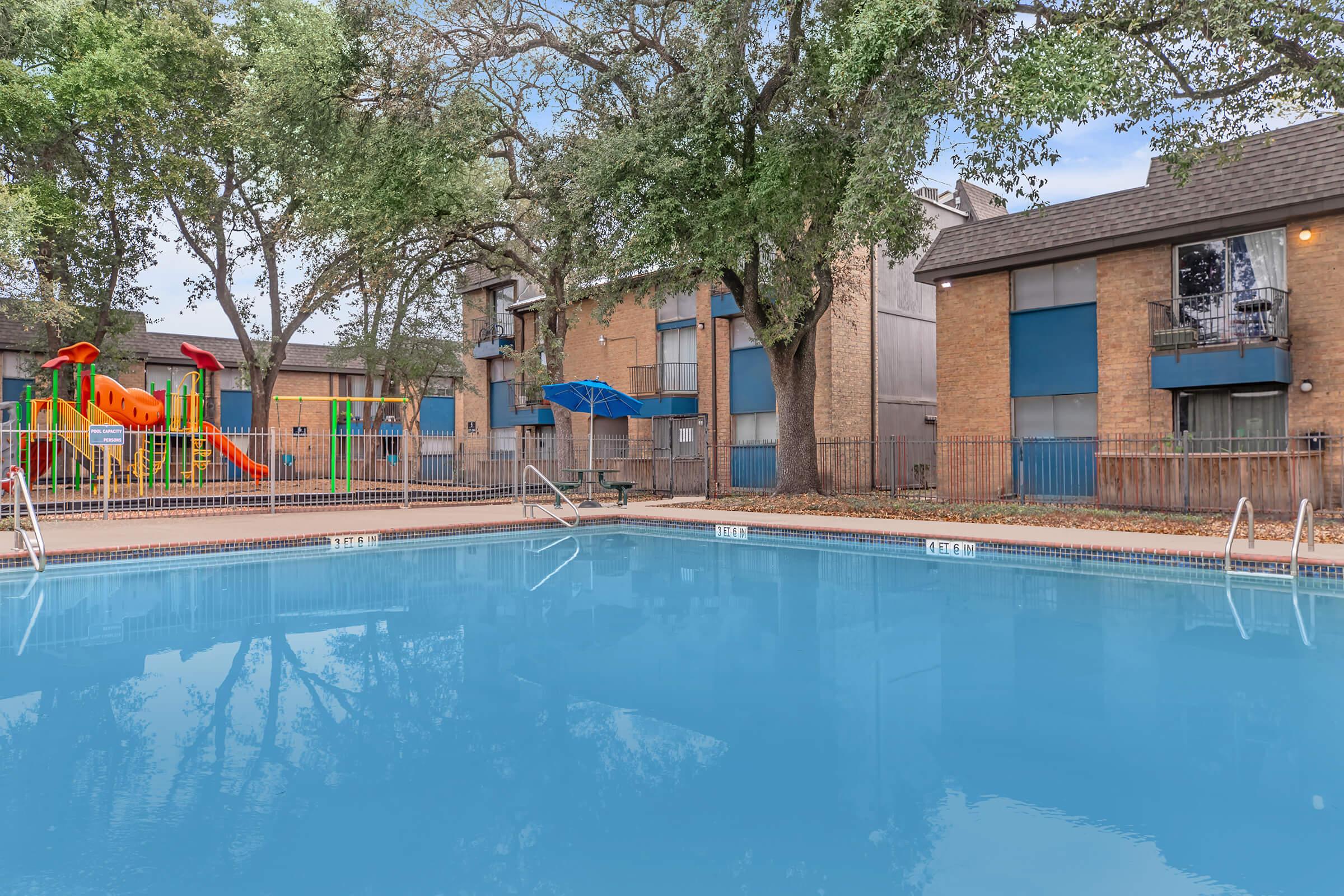 a house with a large pool of water