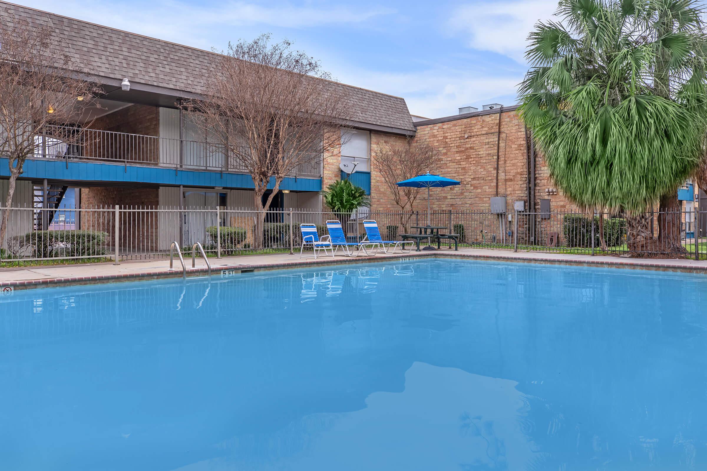 a house with a large pool of water