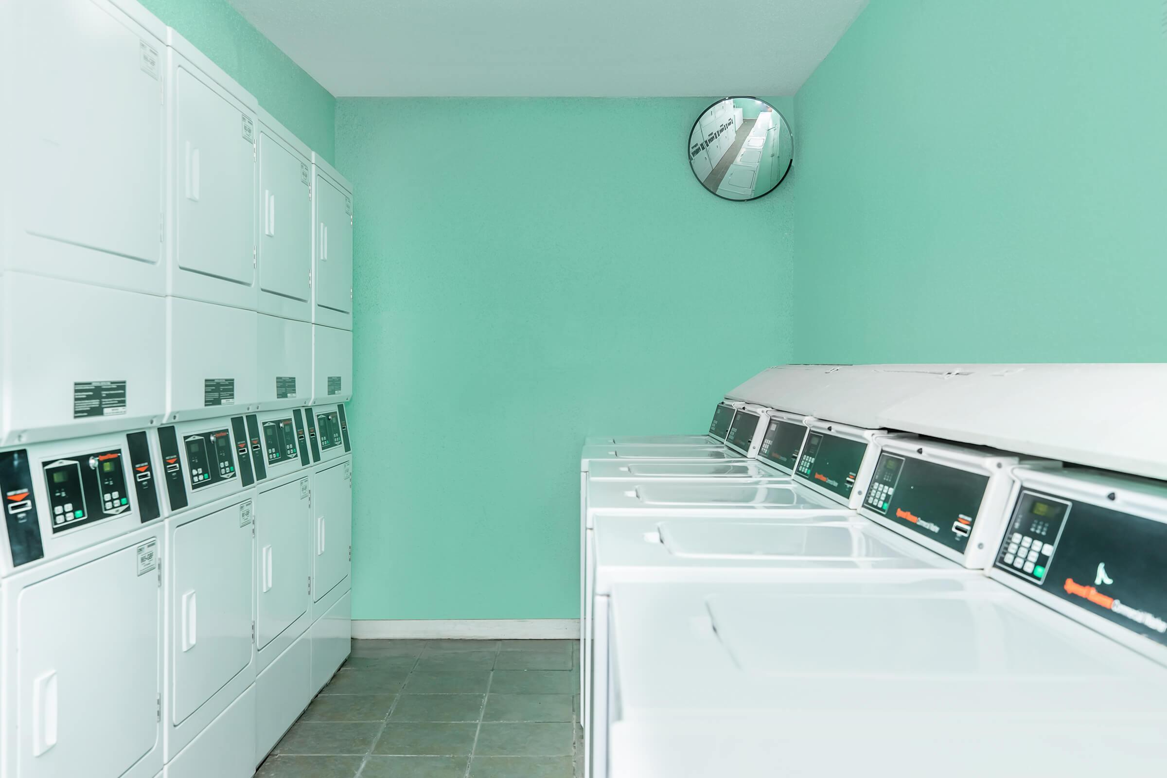 a kitchen with a green door