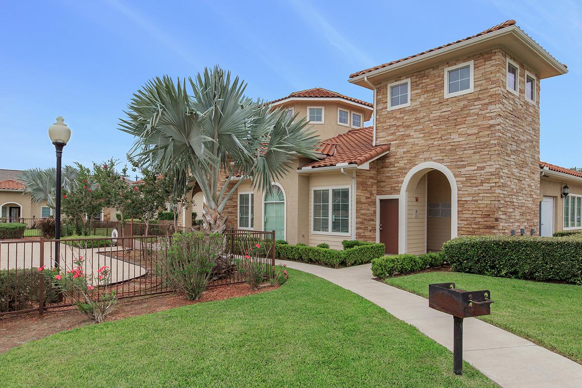 a large lawn in front of a house