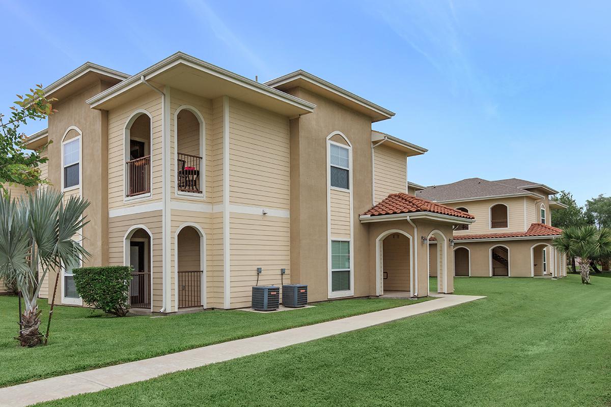 a large lawn in front of a house