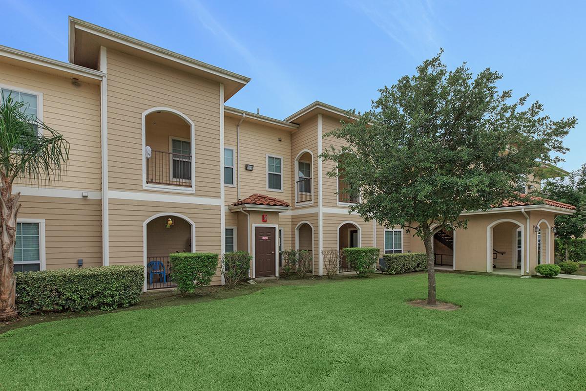 a large lawn in front of a house