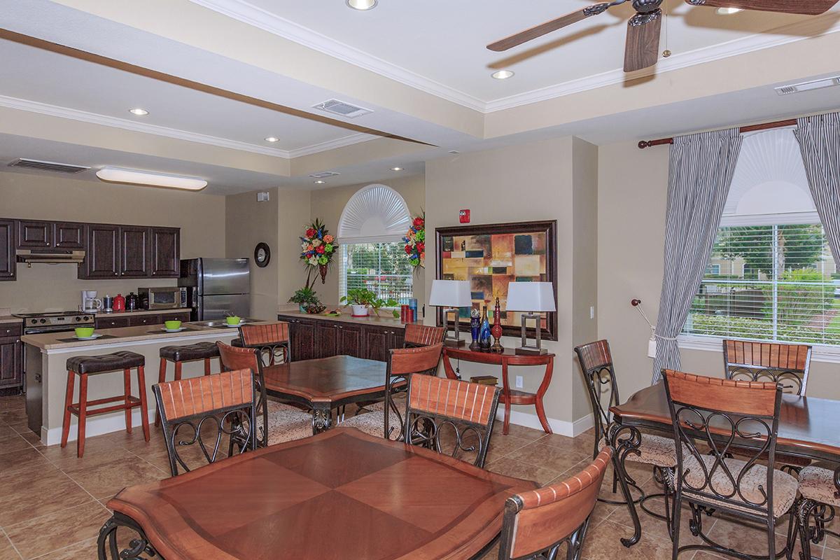 a living room filled with furniture and a fireplace