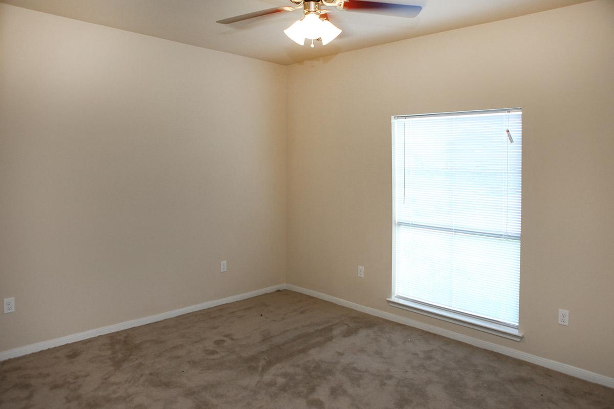 a room with a sink and a window