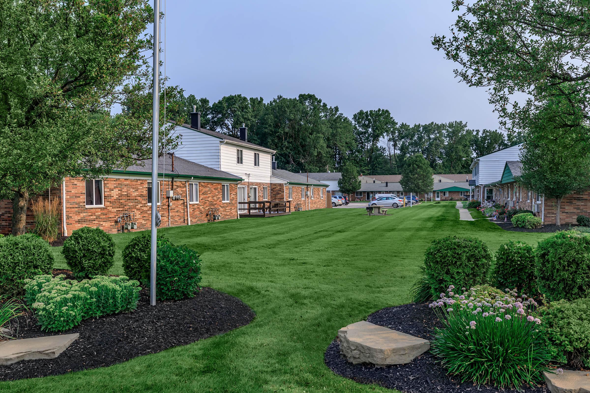 a large lawn in front of a house