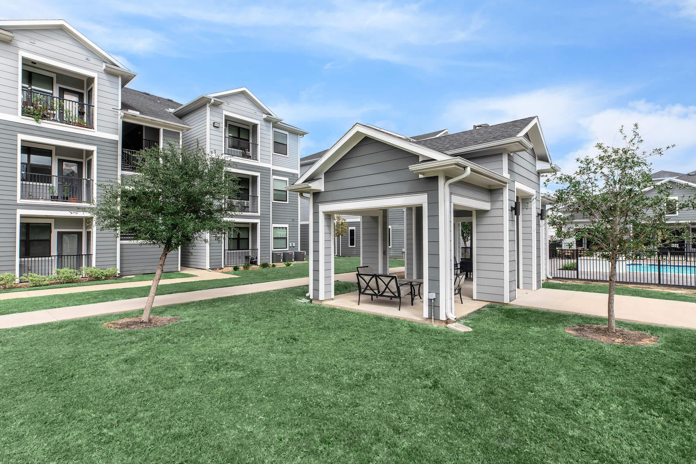 a large lawn in front of a house