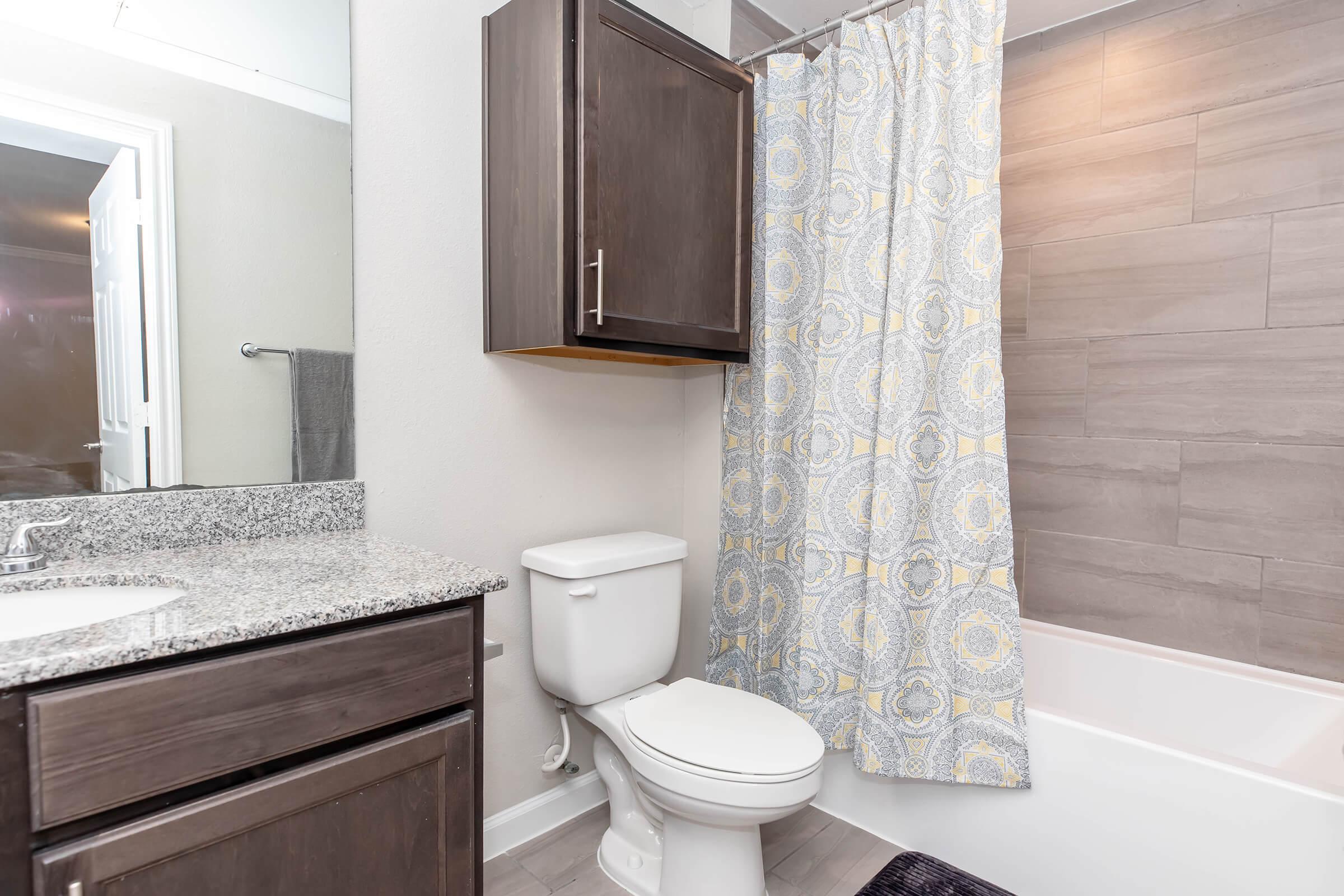 a bedroom with a shower curtain