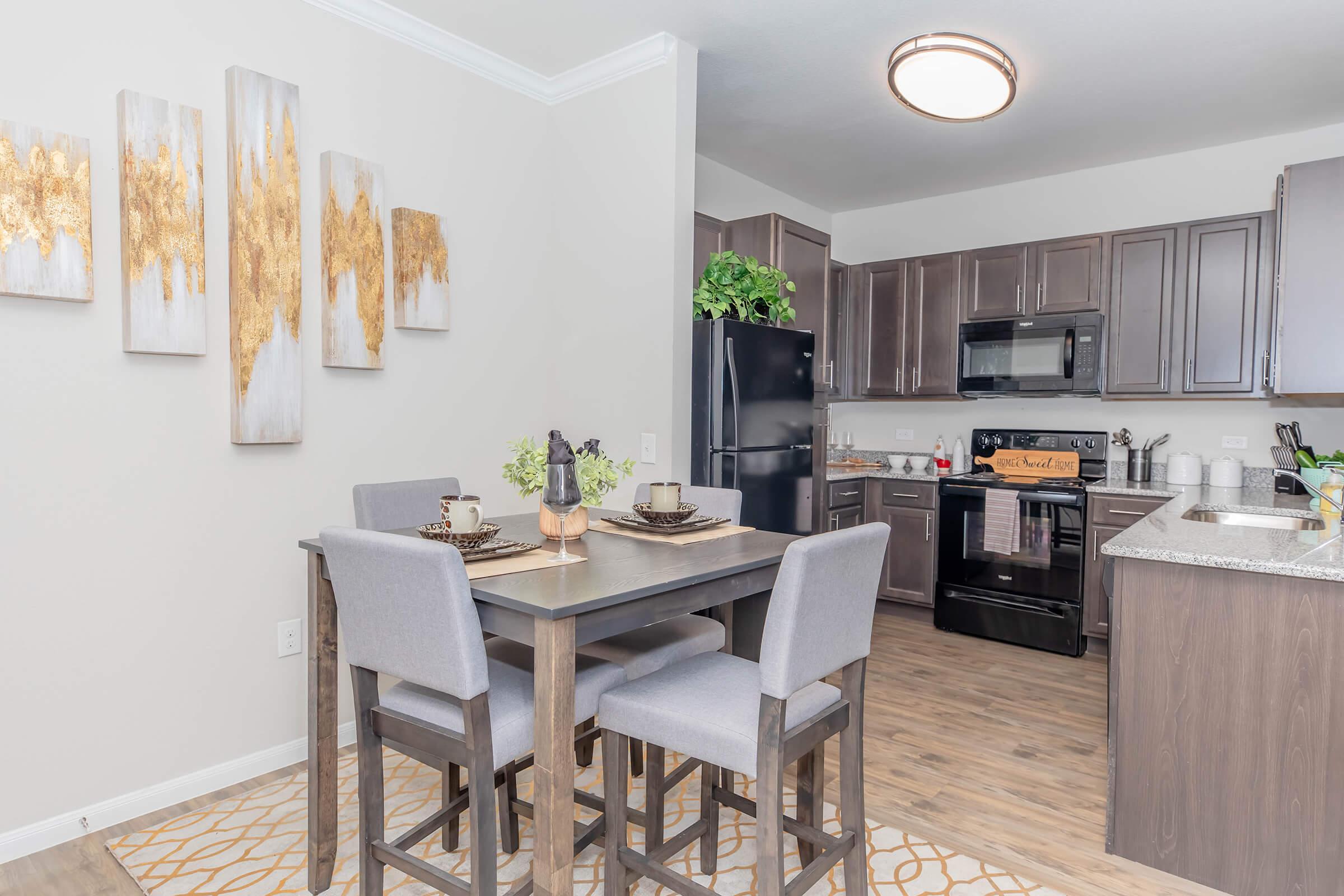 a kitchen with a dining table