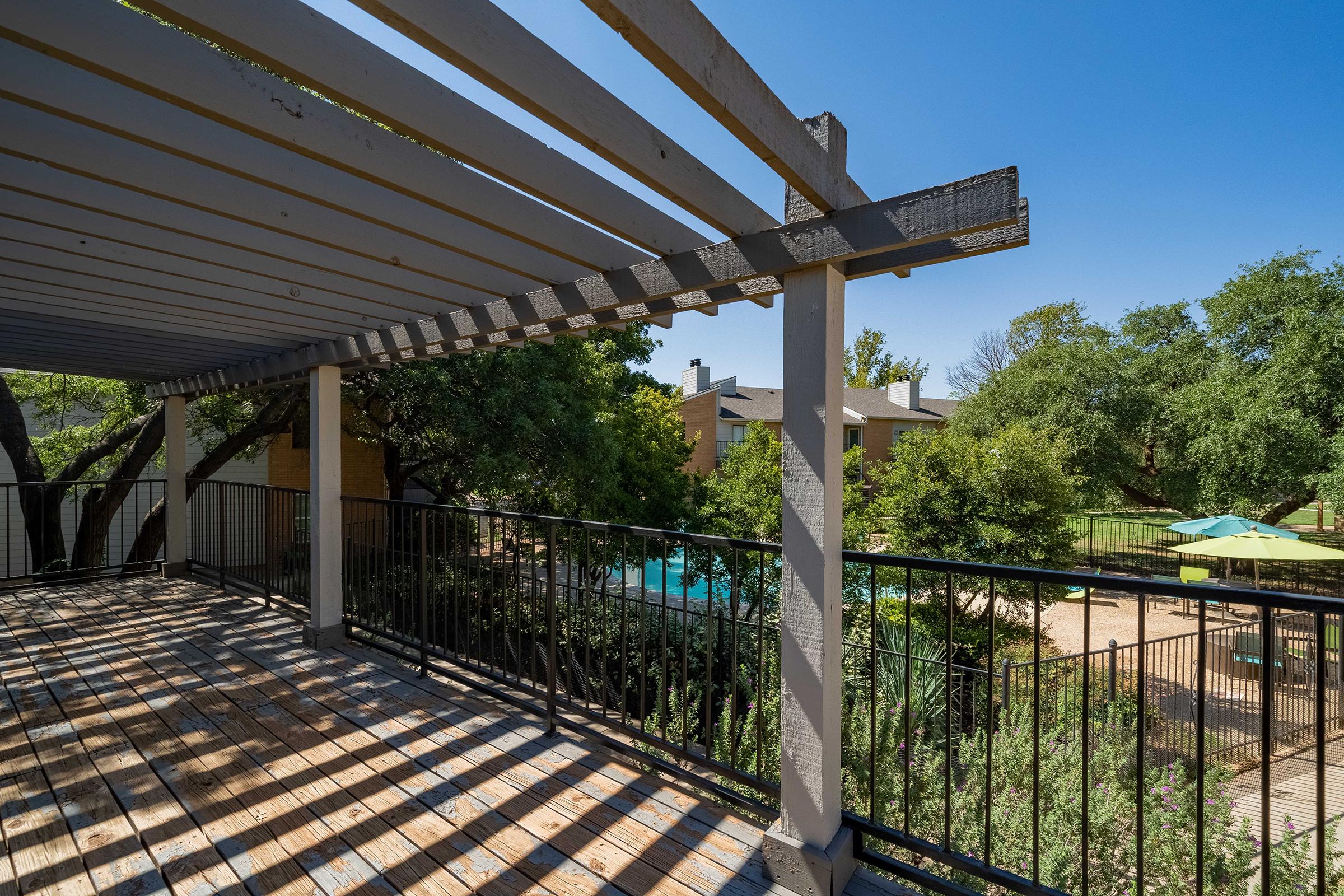 a building with a metal fence