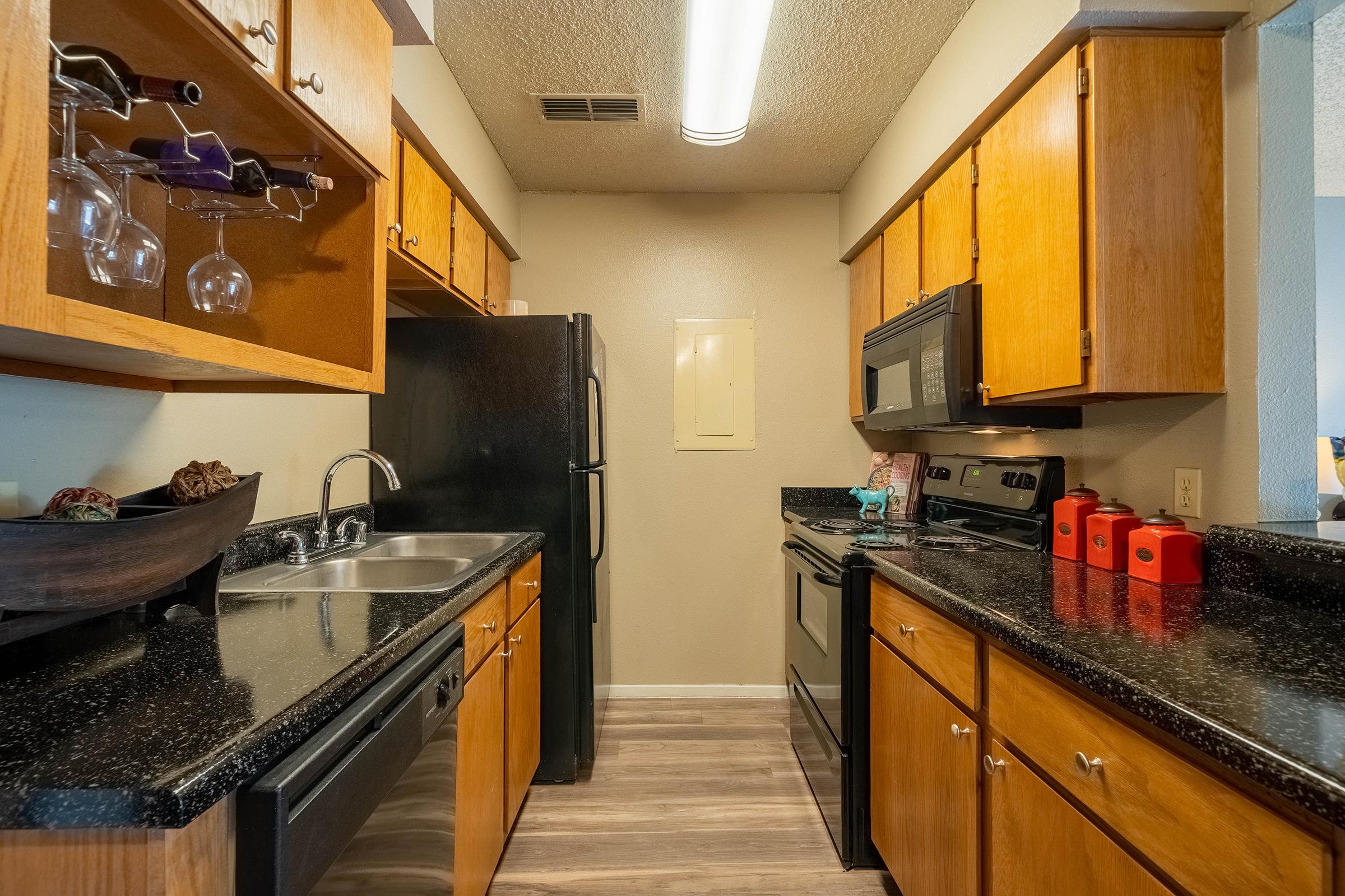 a large kitchen with stainless steel appliances