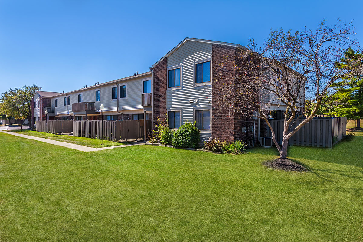 a large lawn in front of a house