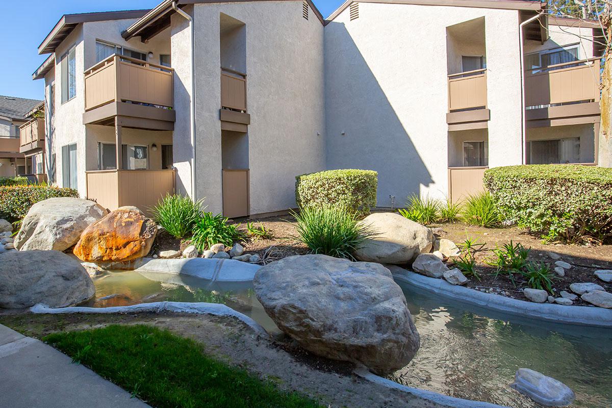 Mountain View Apartment Homes water feature next to community building