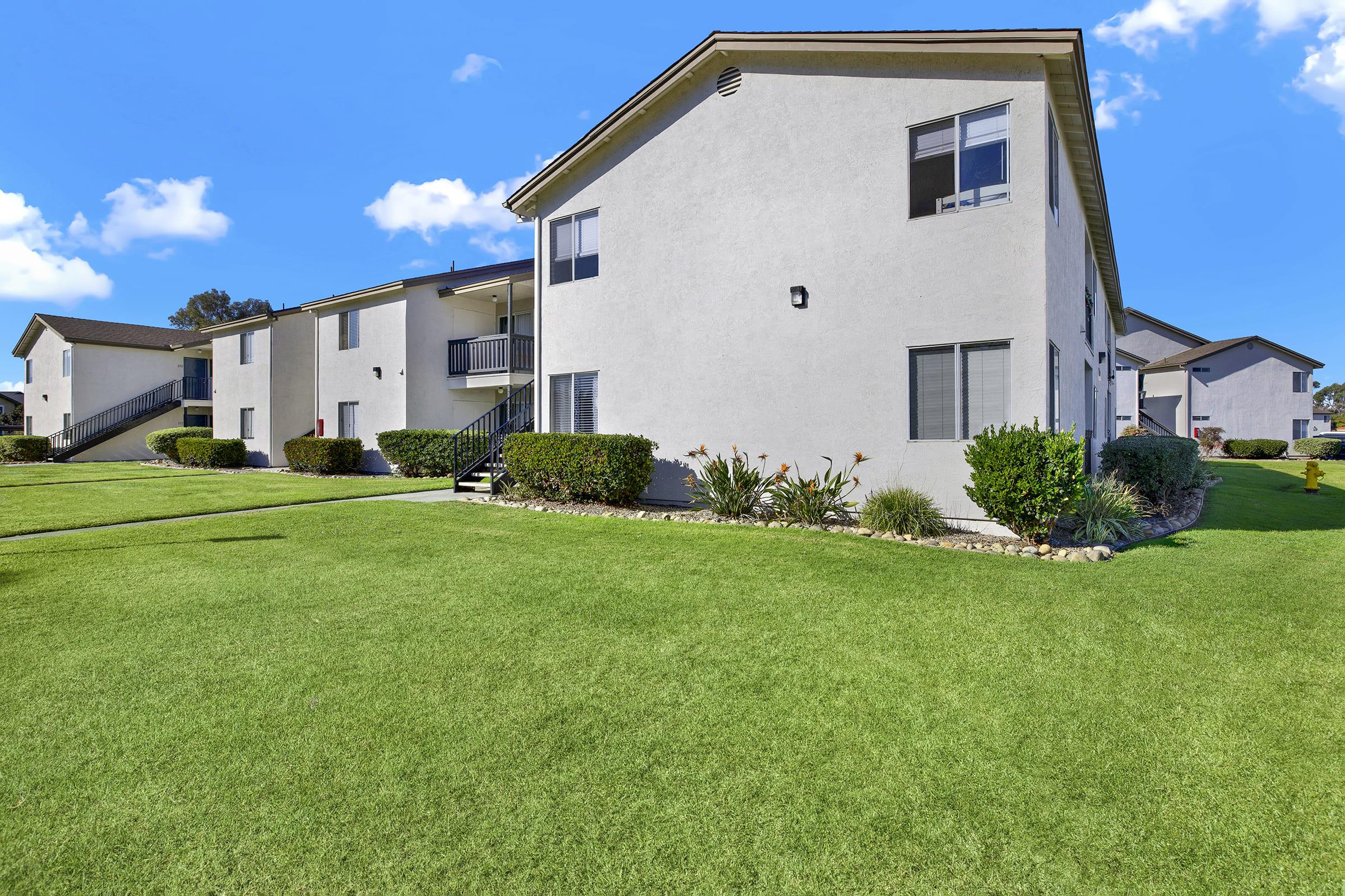 a large lawn in front of a house