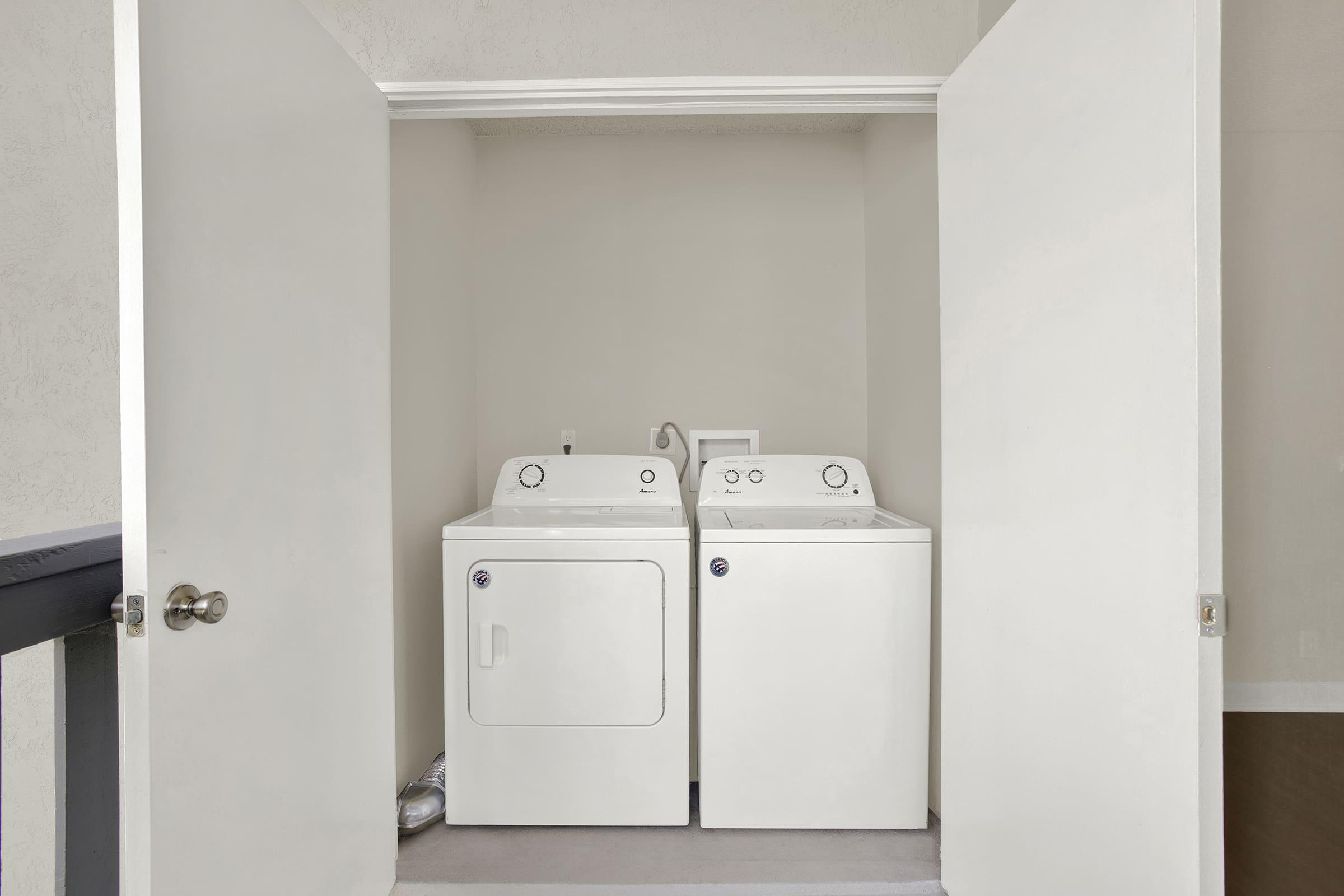 a kitchen with a sink and a refrigerator