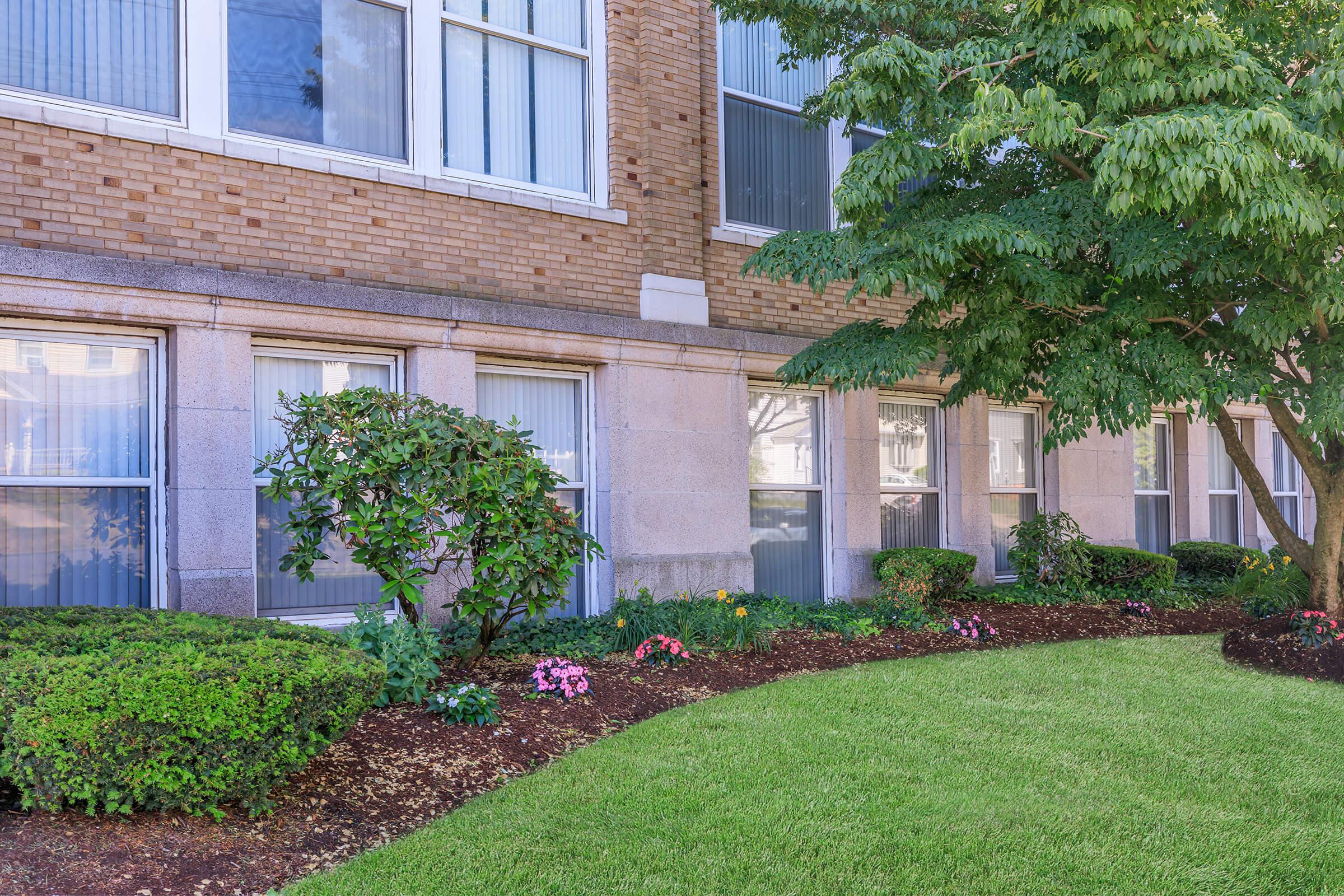 a garden in front of a building