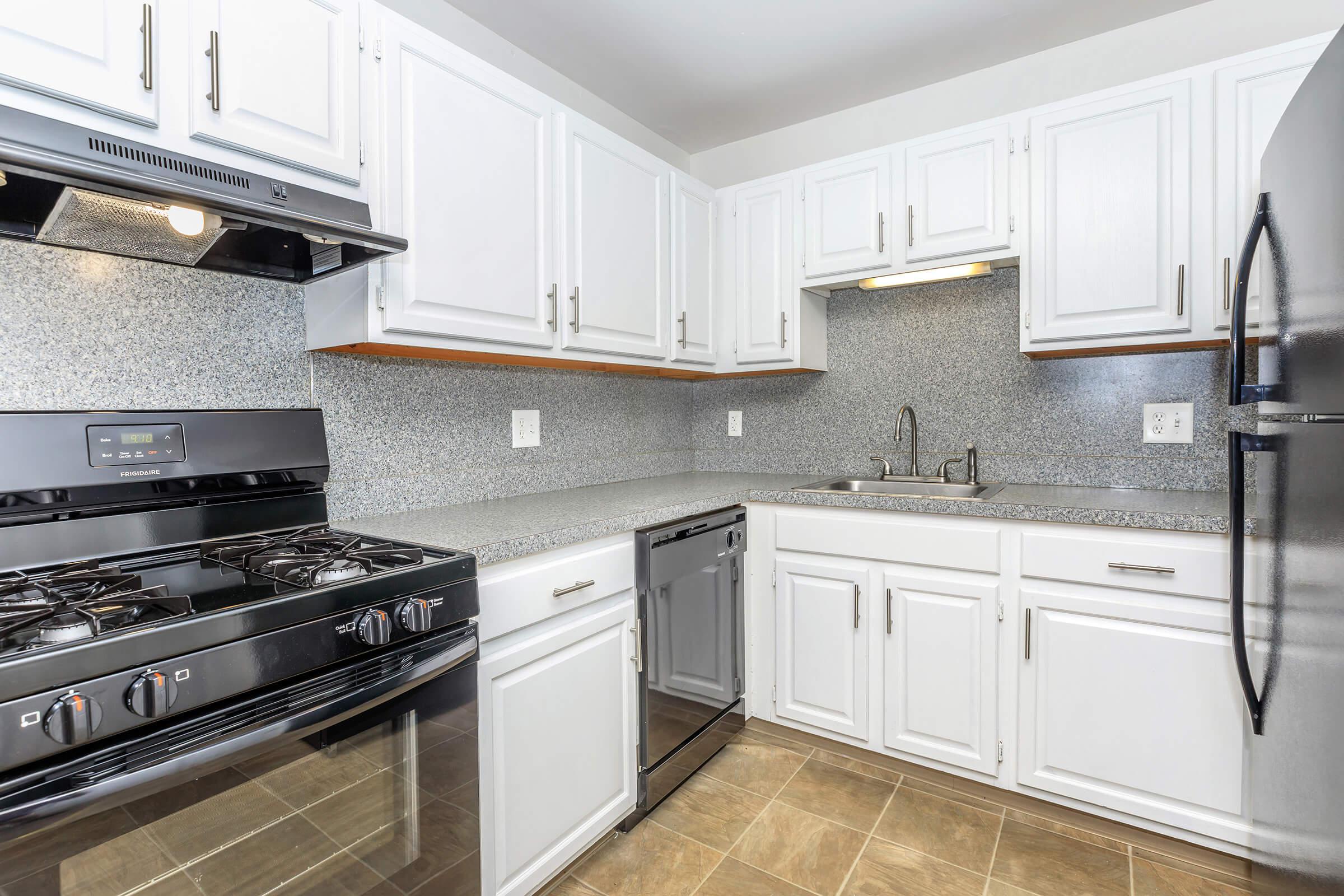 a modern kitchen with stainless steel appliances