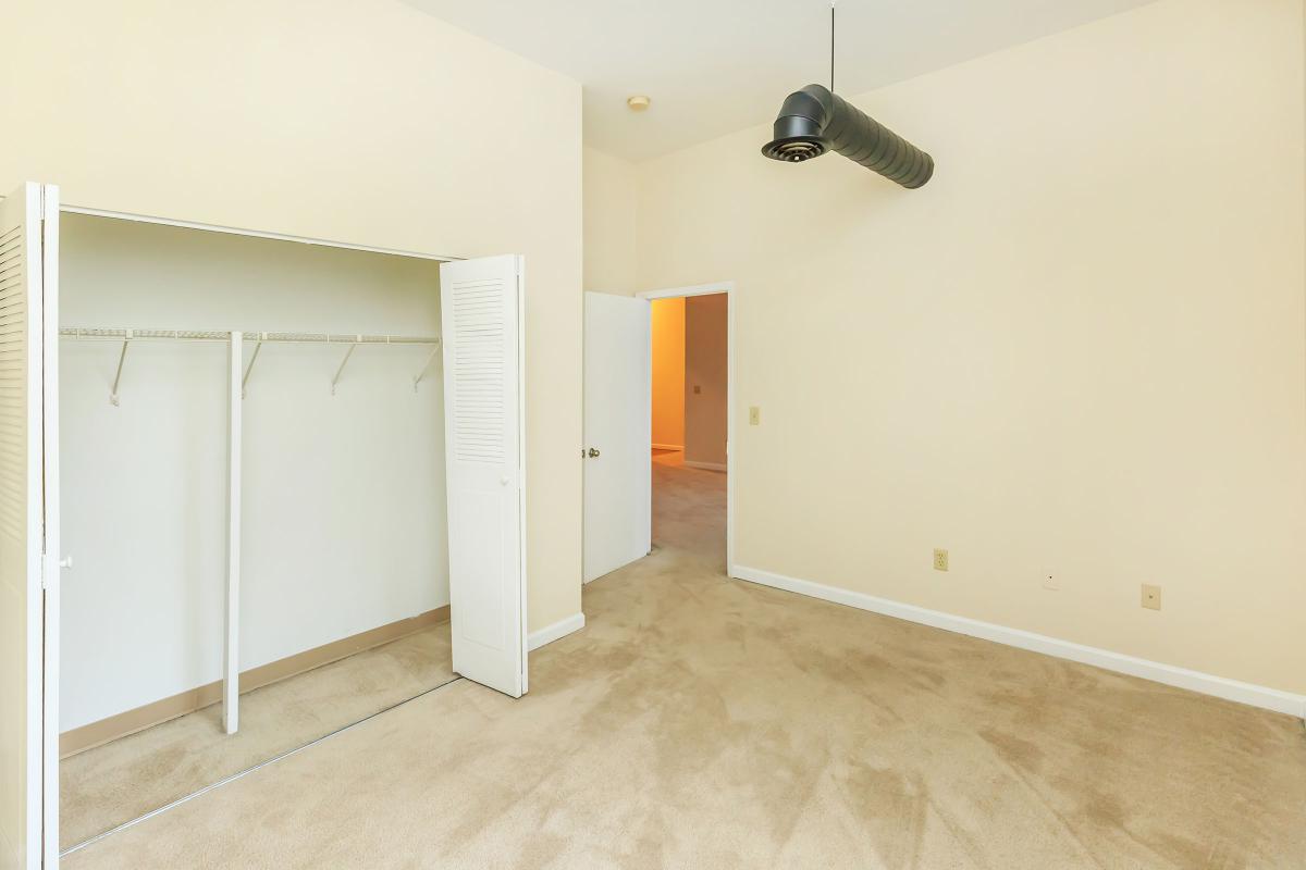 a white refrigerator freezer sitting inside of a building