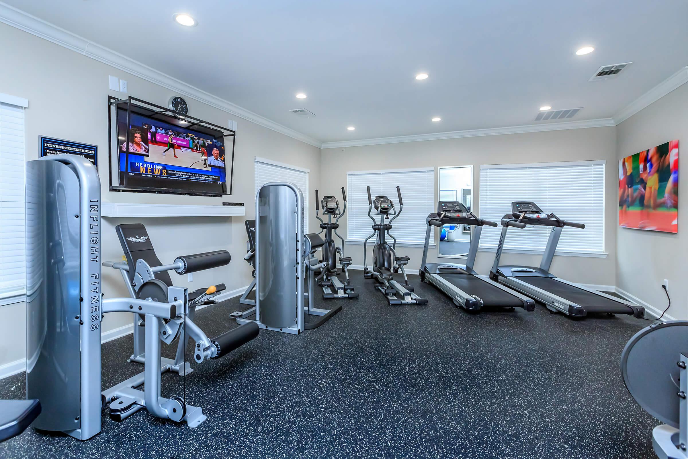 a room filled with furniture and a tv