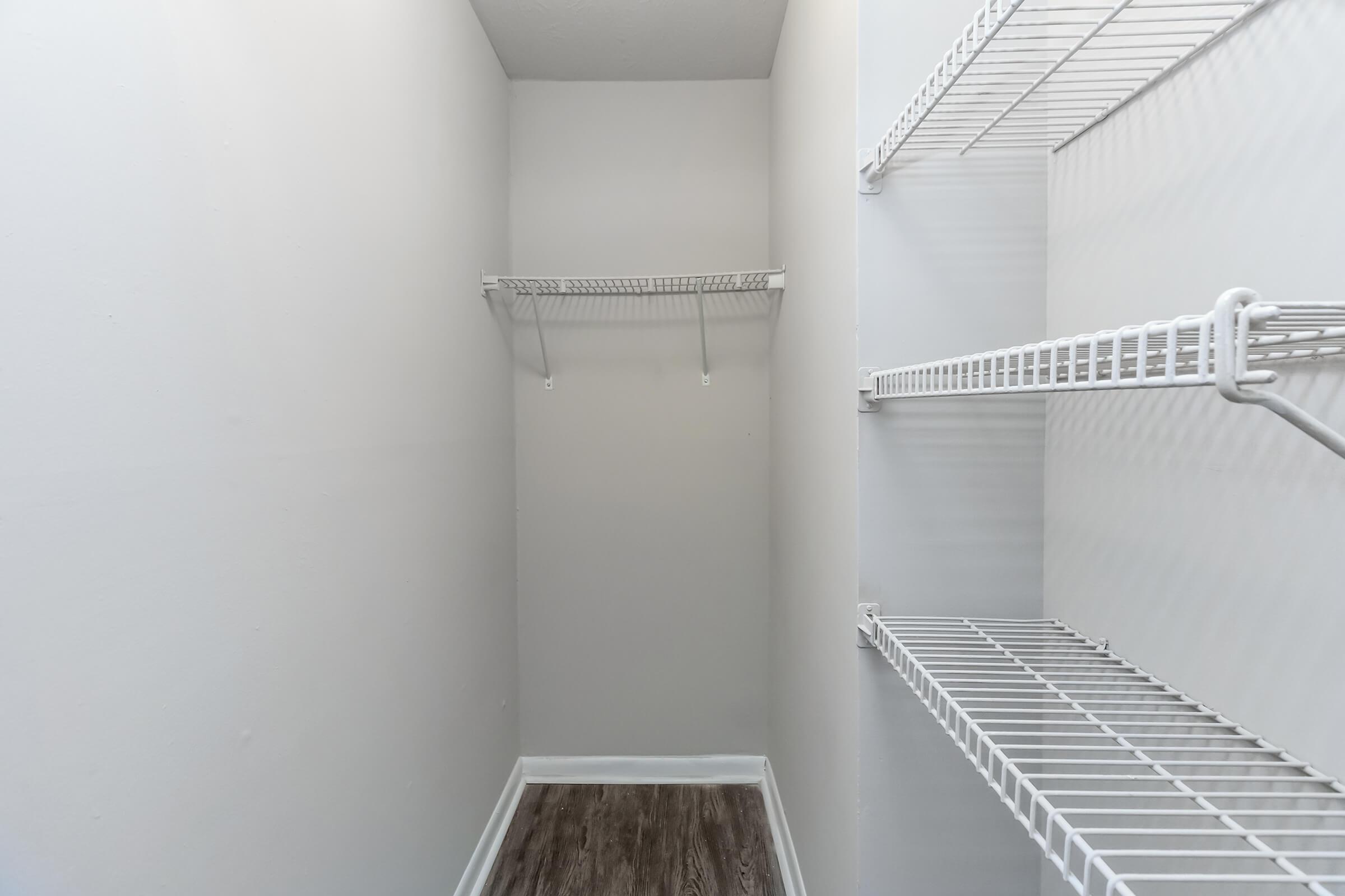 a white tub sitting next to a shower