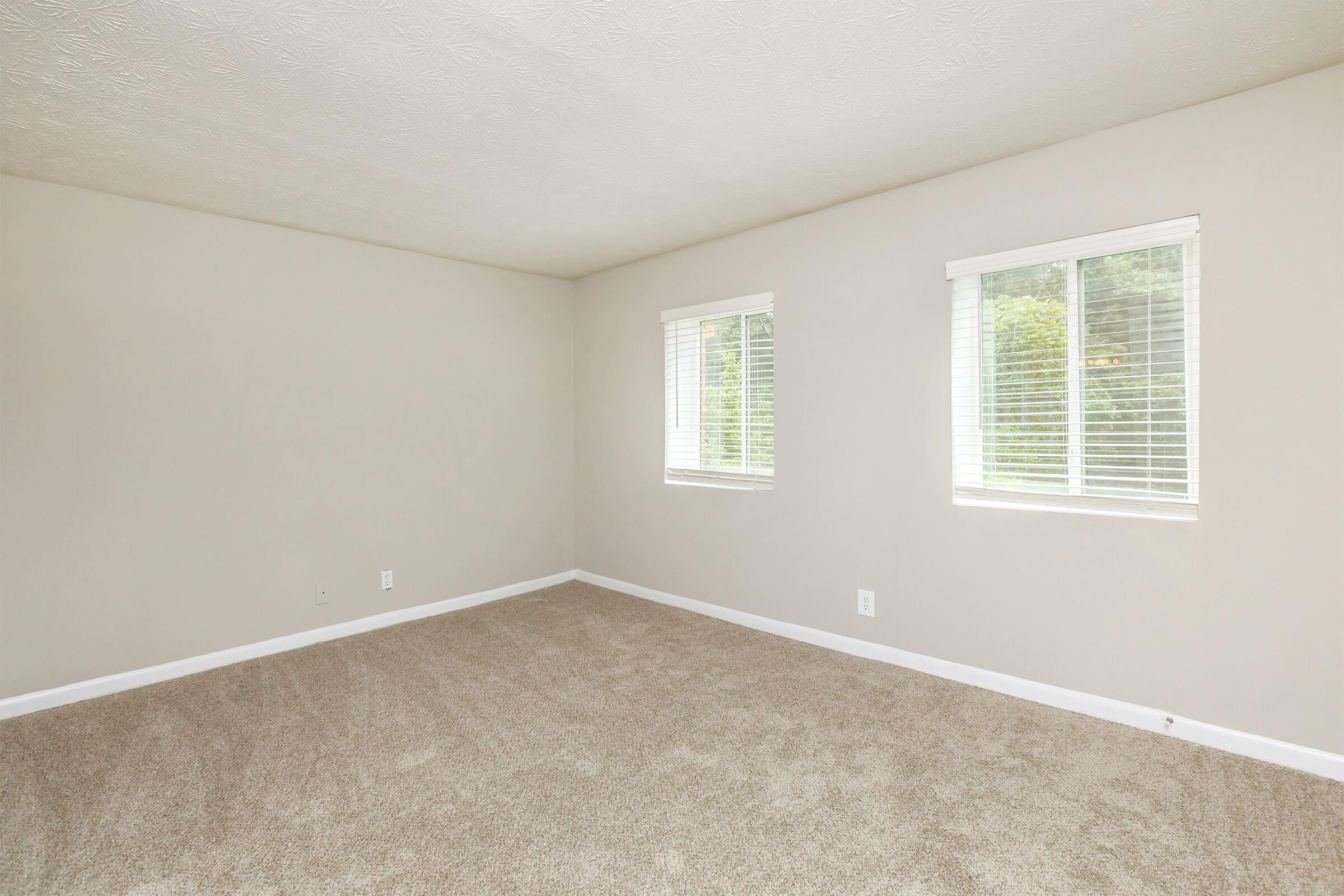 a room with a sink and a window