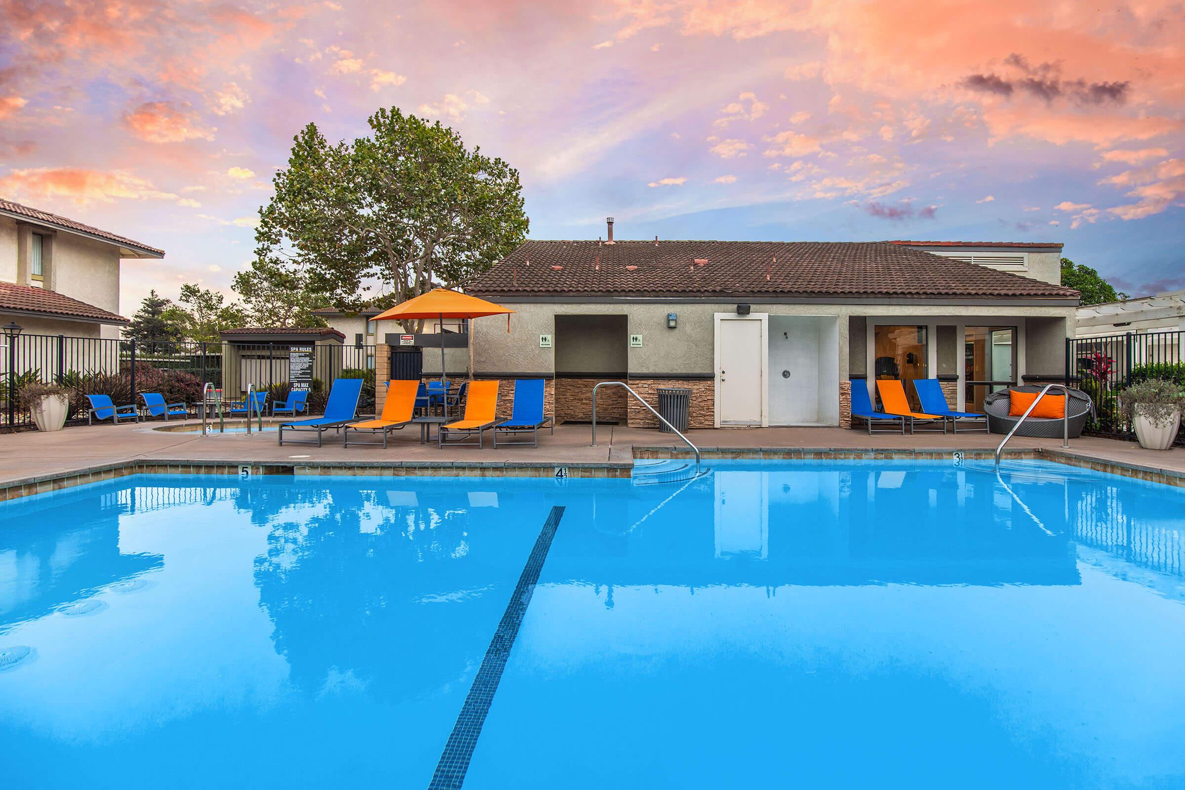 a large pool of water in front of a building