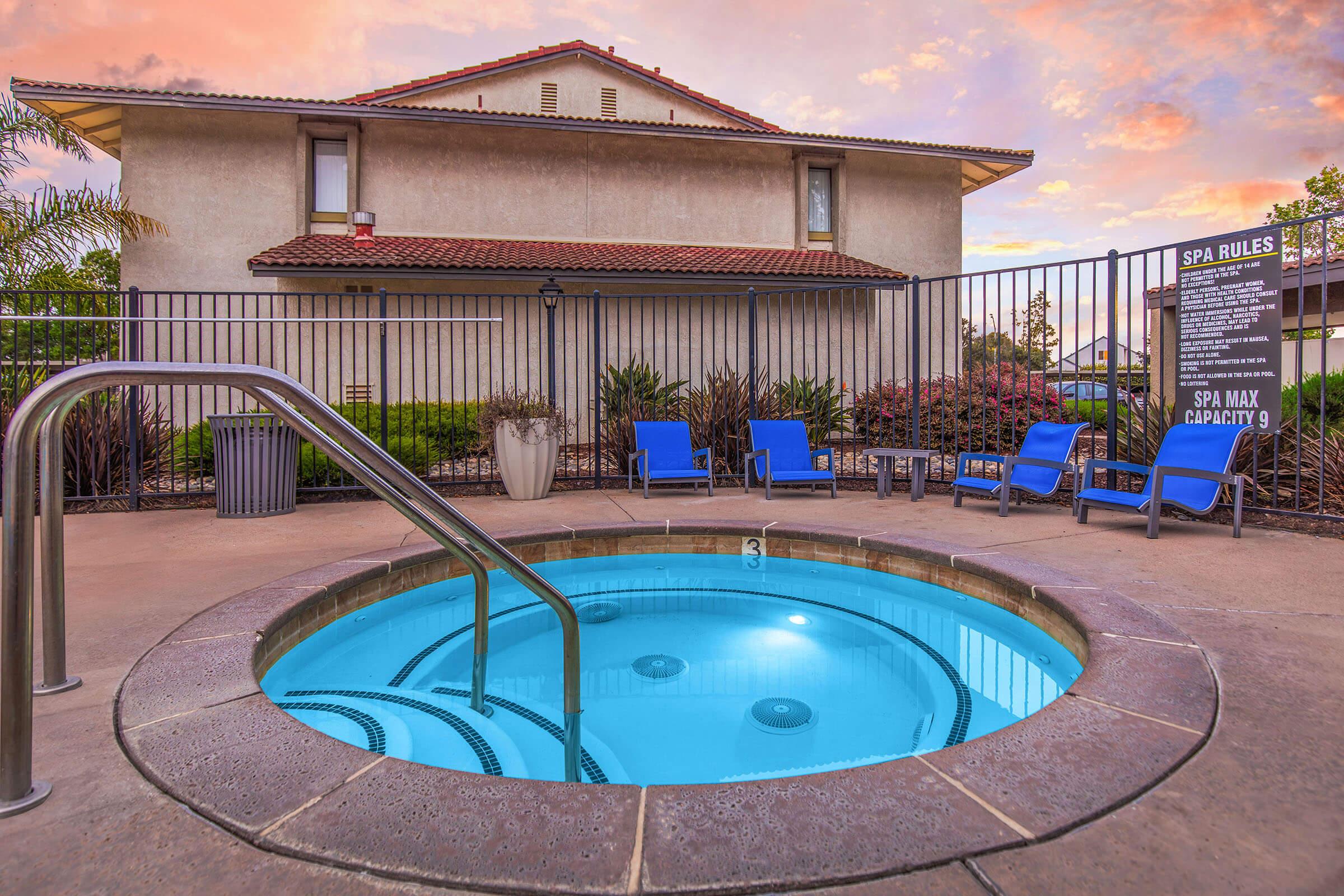 a pool in front of a building